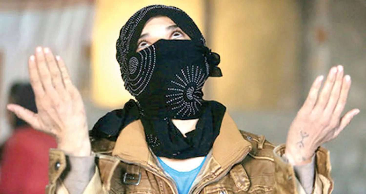 إحدى زوجات «داعش» بعد انتهاء محنة الأسر («الشرق الأوسط»)