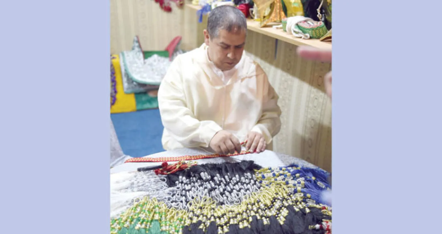 مستلزمات الخيل وما يتعلق بها من زينة في جناح الحرف المغربية بسوق عكاظ