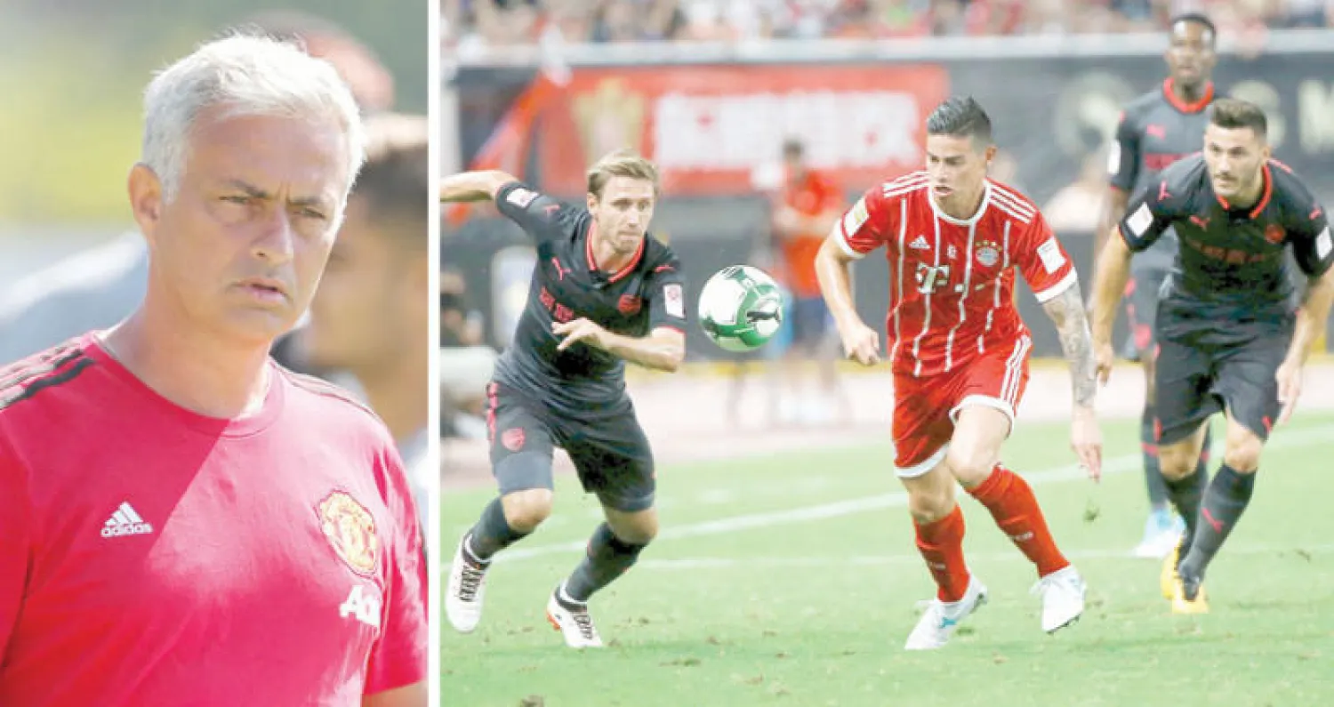 رودريغيز نجم البايرن الجديد في محاولة لاختراق دفاع آرسنال أمس (رويترز)  -  مورينيو أعرب عن أمله في الاستمرار مع يونايتد 15 عاماً (رويترز)