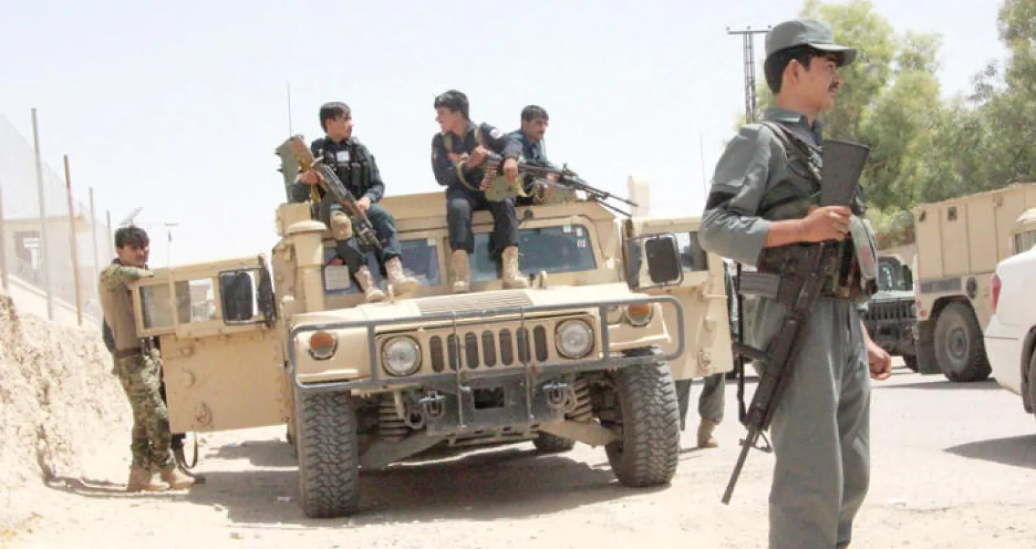 قوات أفغانية تستعد للمشاركة في العمليات ضد عناصر «طالبان» في غريشك بولاية هلمند بجنوب أفغانستان (أ.ف.ب)