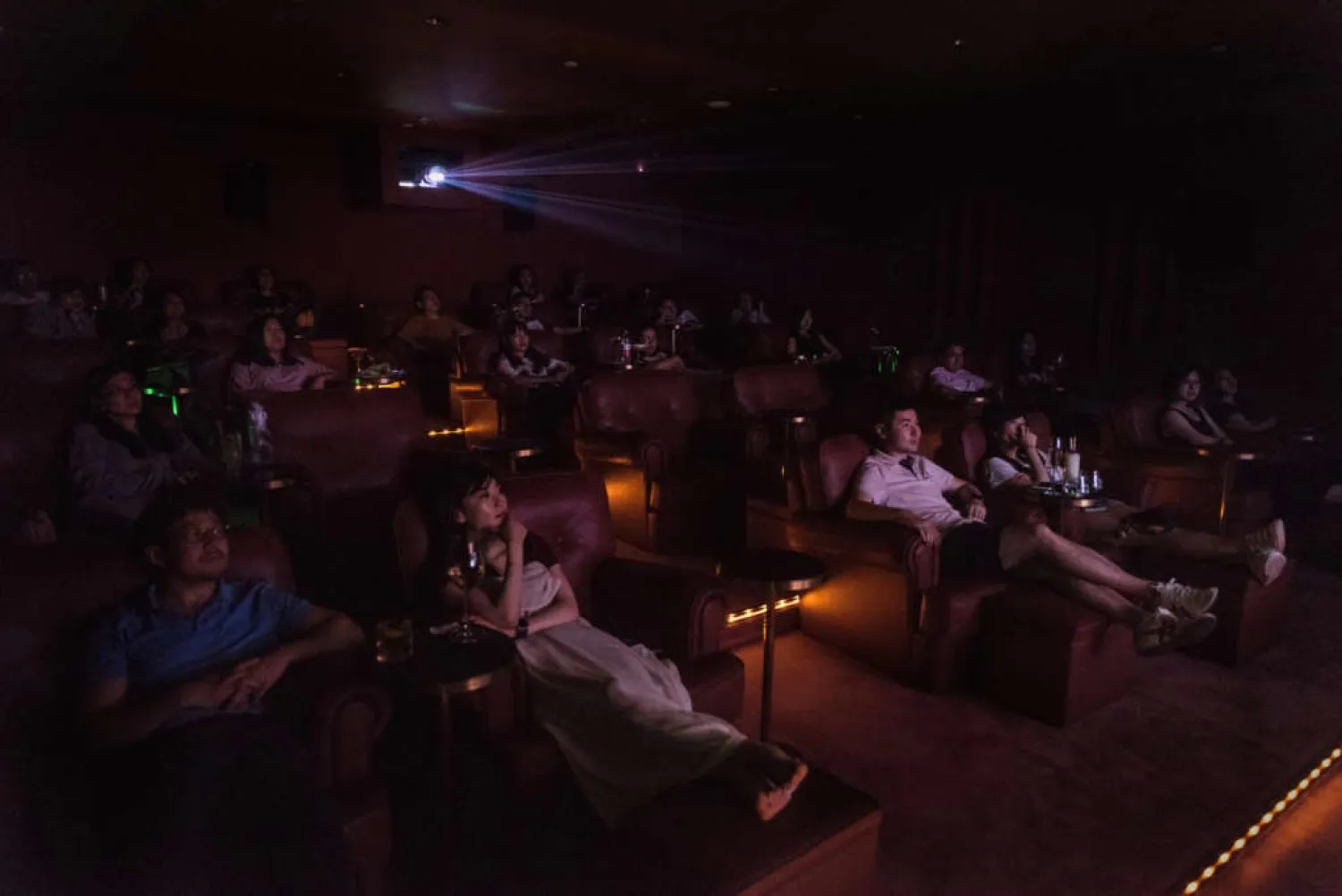 A screening of a play from London’s Royal National Theater at Cinker, a luxury cinema in Beijing. Cinker’s three partners envisioned it as a place for movie lovers who want to revisit Hollywood classics, European art house films and vintage Chinese favorites. Credit Gilles Sabrié for The New York Times 