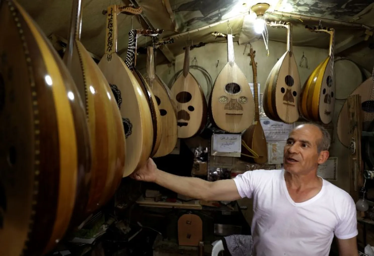 The conflict in Syria has devastated many of its historic crafts, including the production of the oud, the oriental lute. (AFP)