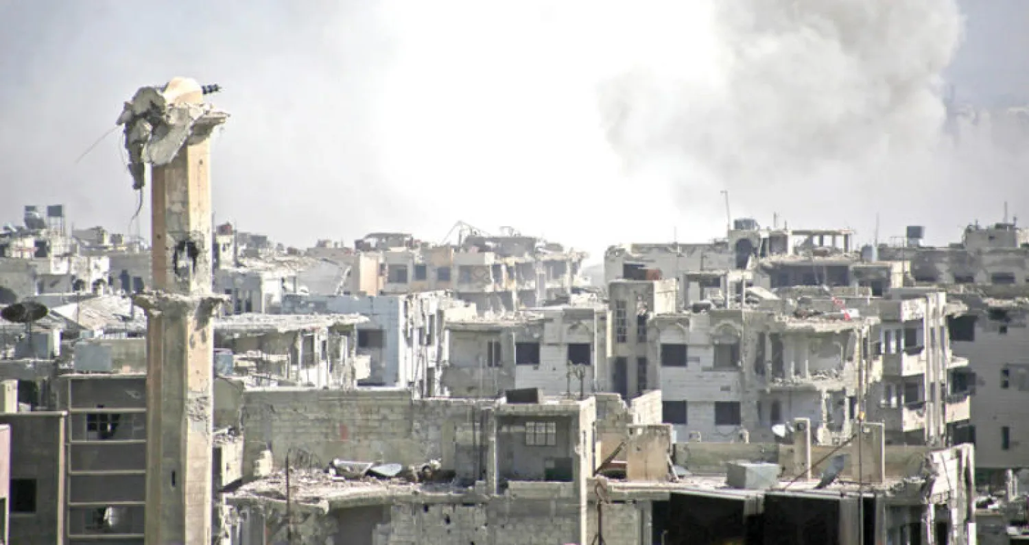 تصاعد الدخان بعد قصف عنيف على حي جوبر الدمشقي (أ.ف.ب)