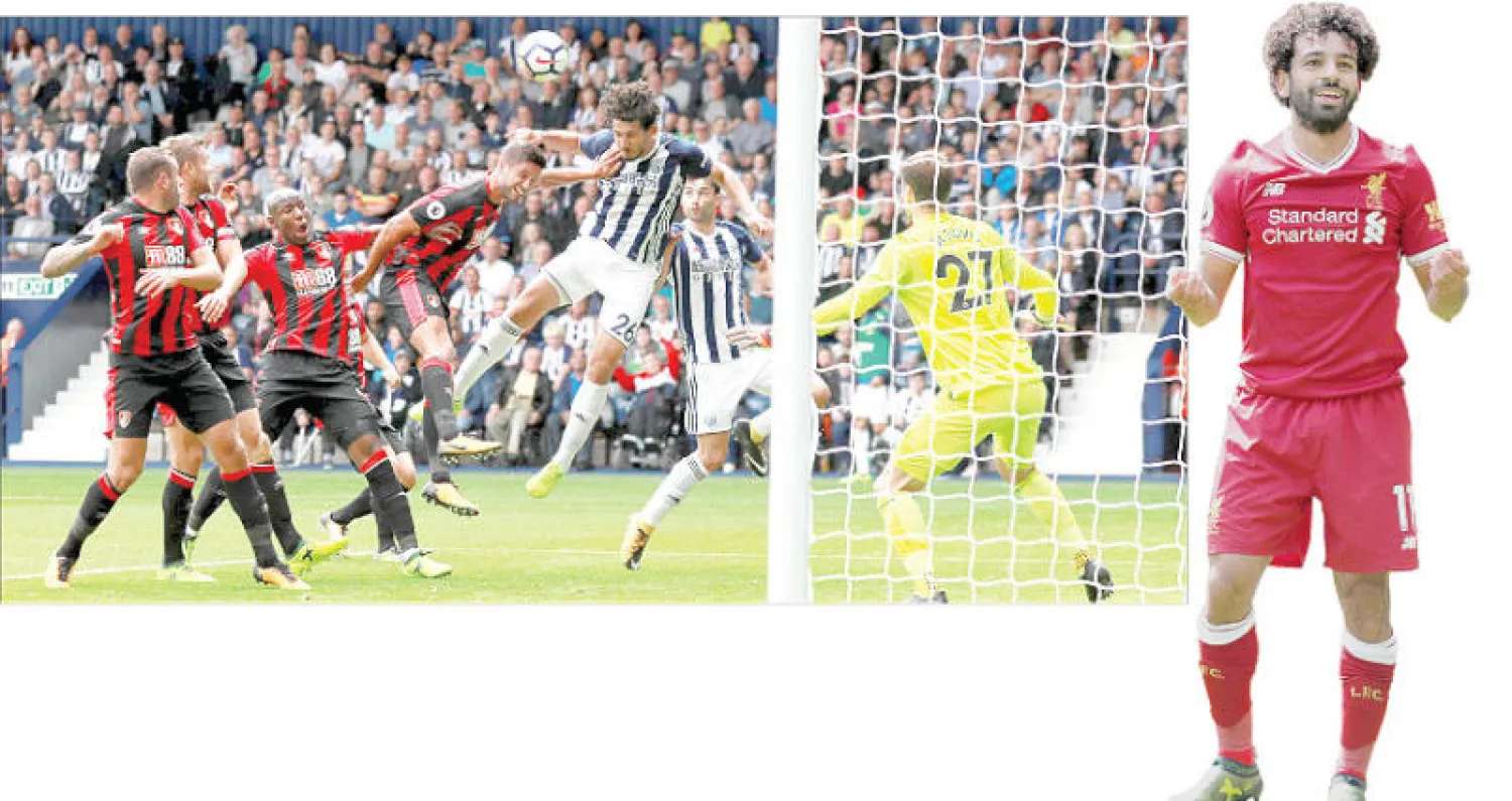 صلاح بعد إحراز أول أهدافه الرسمية مع ليفربول (رويترز) - رأسية حجازي تهز شباك بورنموث في أولى مشاركاته مع ويست بروميتش (رويترز)