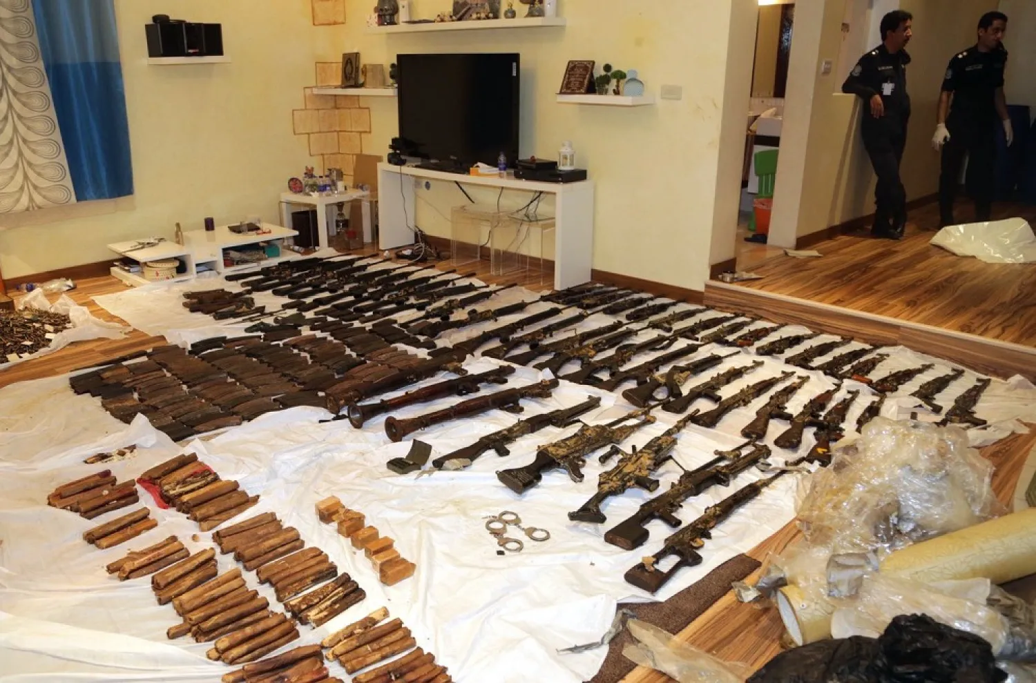 Weapons and ammunition seized by Kuwaiti authorities after their discovery of the al-Abdali cell in 2015. (KUNA)
