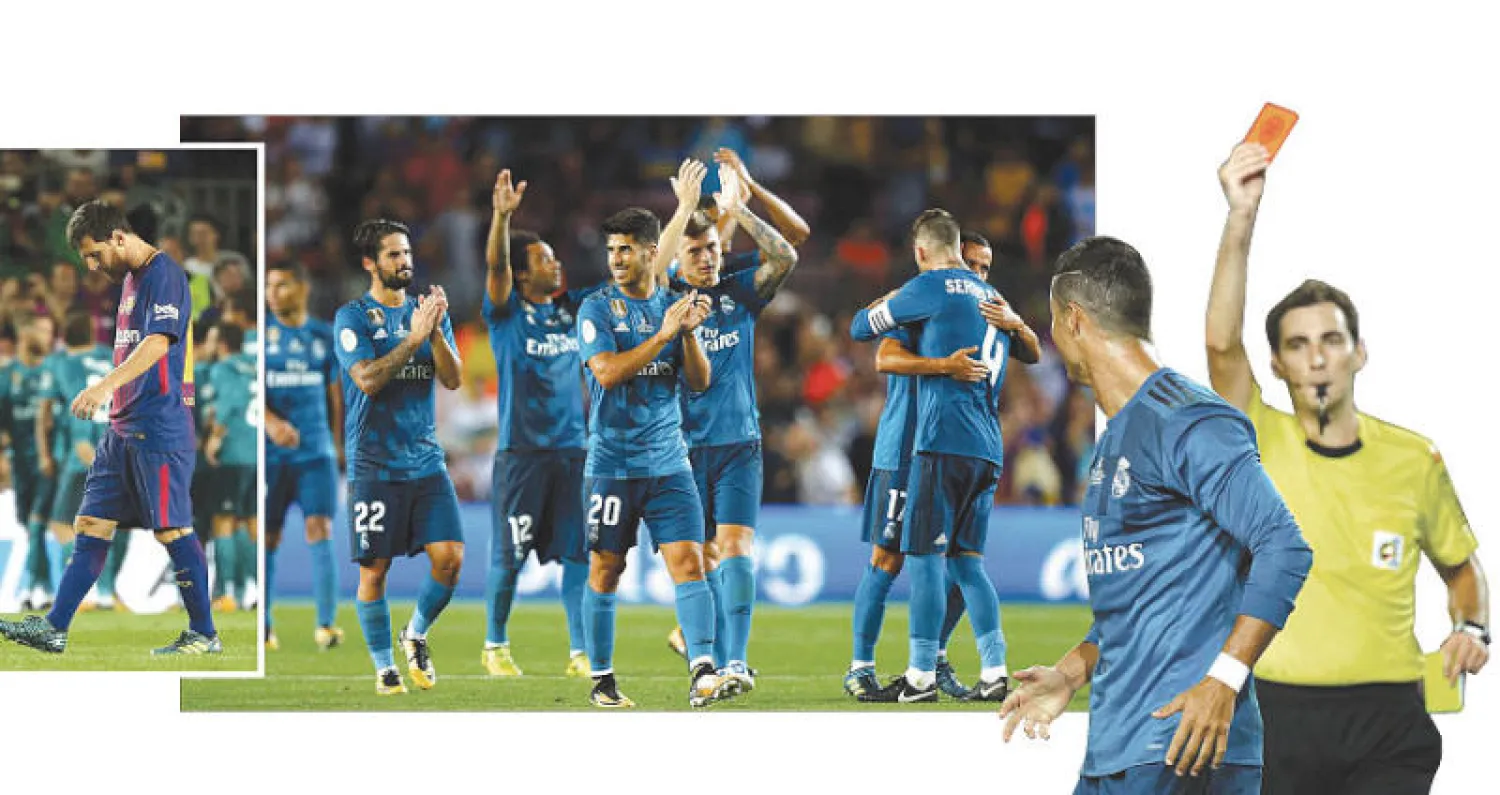 أفراح في ريال مدريد بعد الفوز على غريمه اللدود (رويترز) - ميسي يعيش أجواء الهزيمة (رويترز)