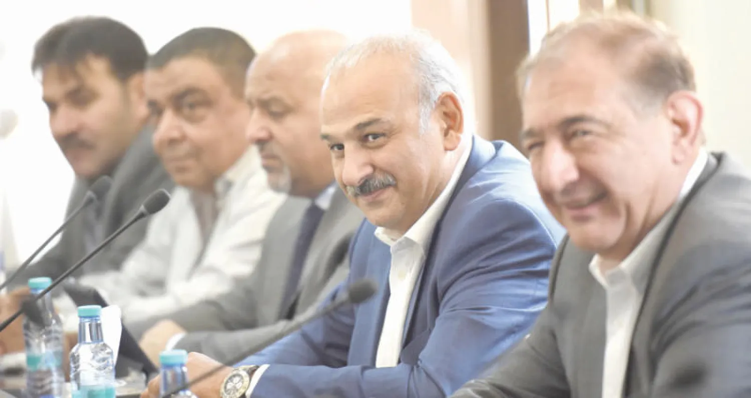 قدري جميل وجمال سليمان ممثلا منصتي موسكو والقاهرة في اجتماع المعارضة في الرياض امس (إ ف ب)