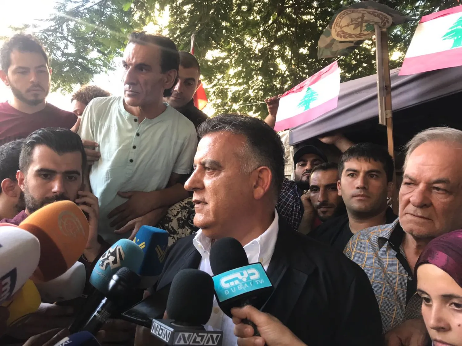 Ibrahim speaks to the families of the abducted soldiers at the tents of the kidnapped soldiers' families at Riad El-Solh Square in downtown Beirut on Sunday/NNA