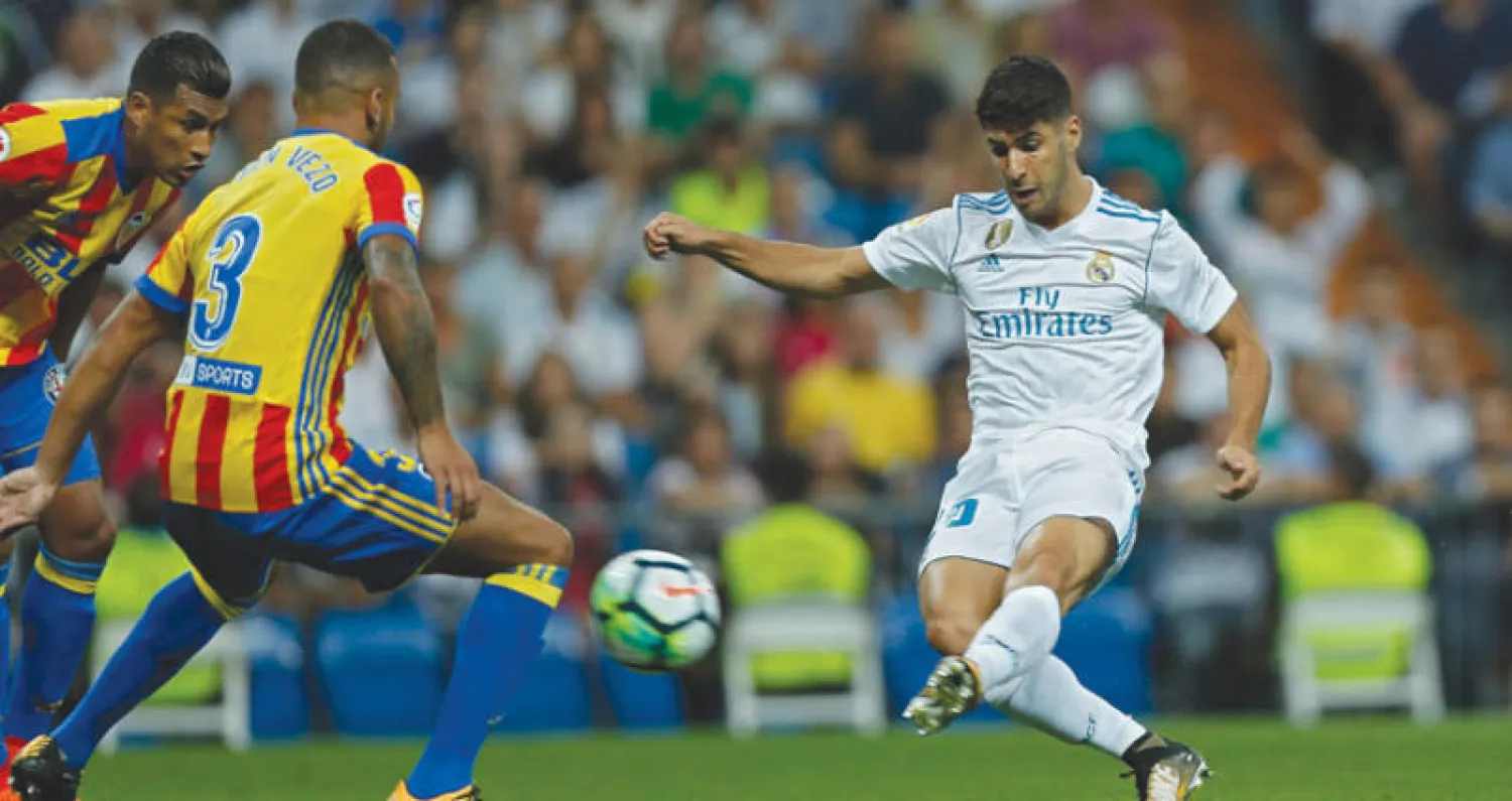 أسنسيو يفتتح التسجيل لريـال مدريد (أ.ب)