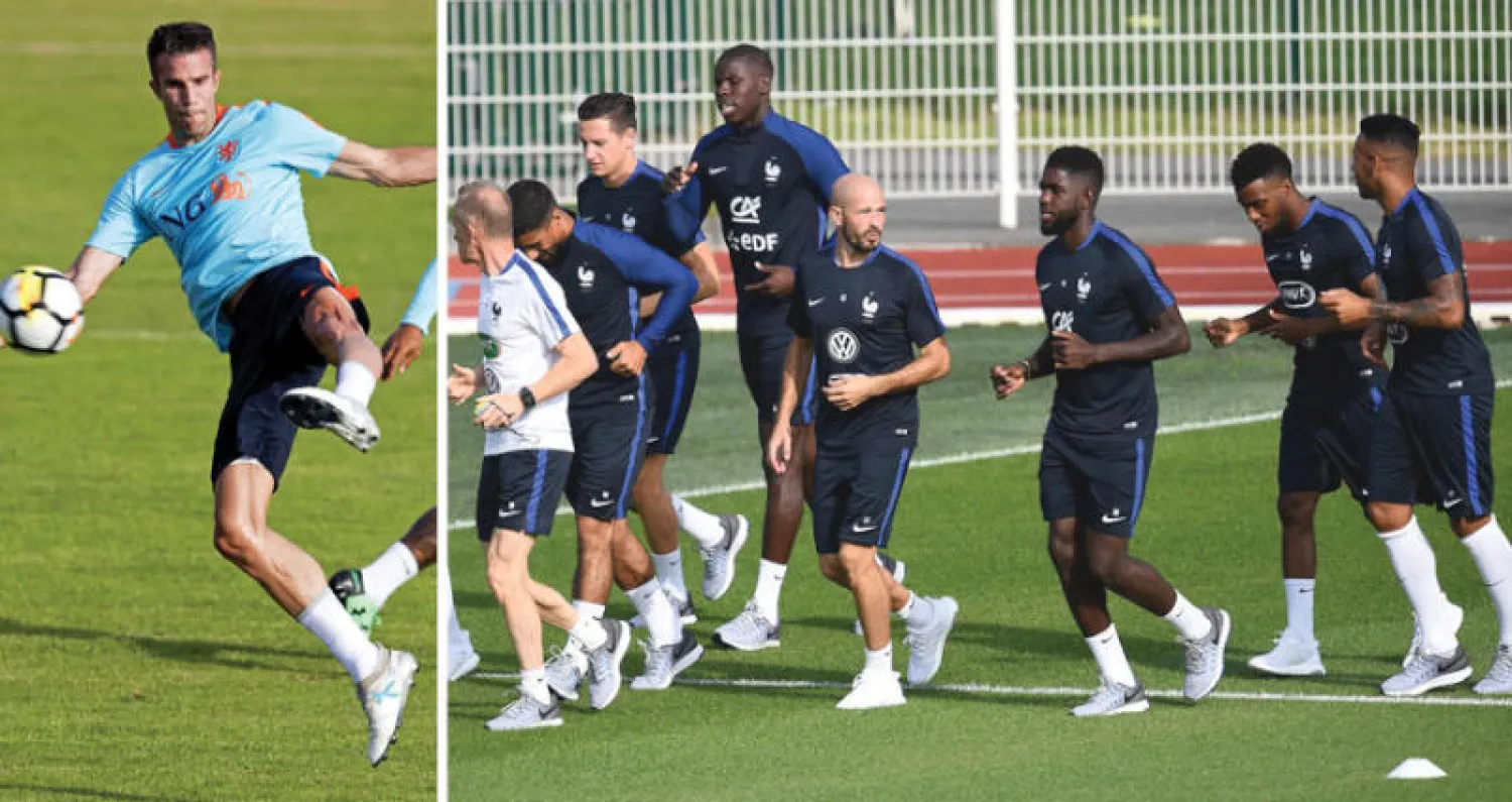 المنتخب الفرنسي يستضيف نظيره الهولندي وعينه على الثلاث نقاط (أ.ف.ب)  -  فان بيرسي يعود إلى تشكيلة هولندا بعد غياب عامين (إ.ب.أ)