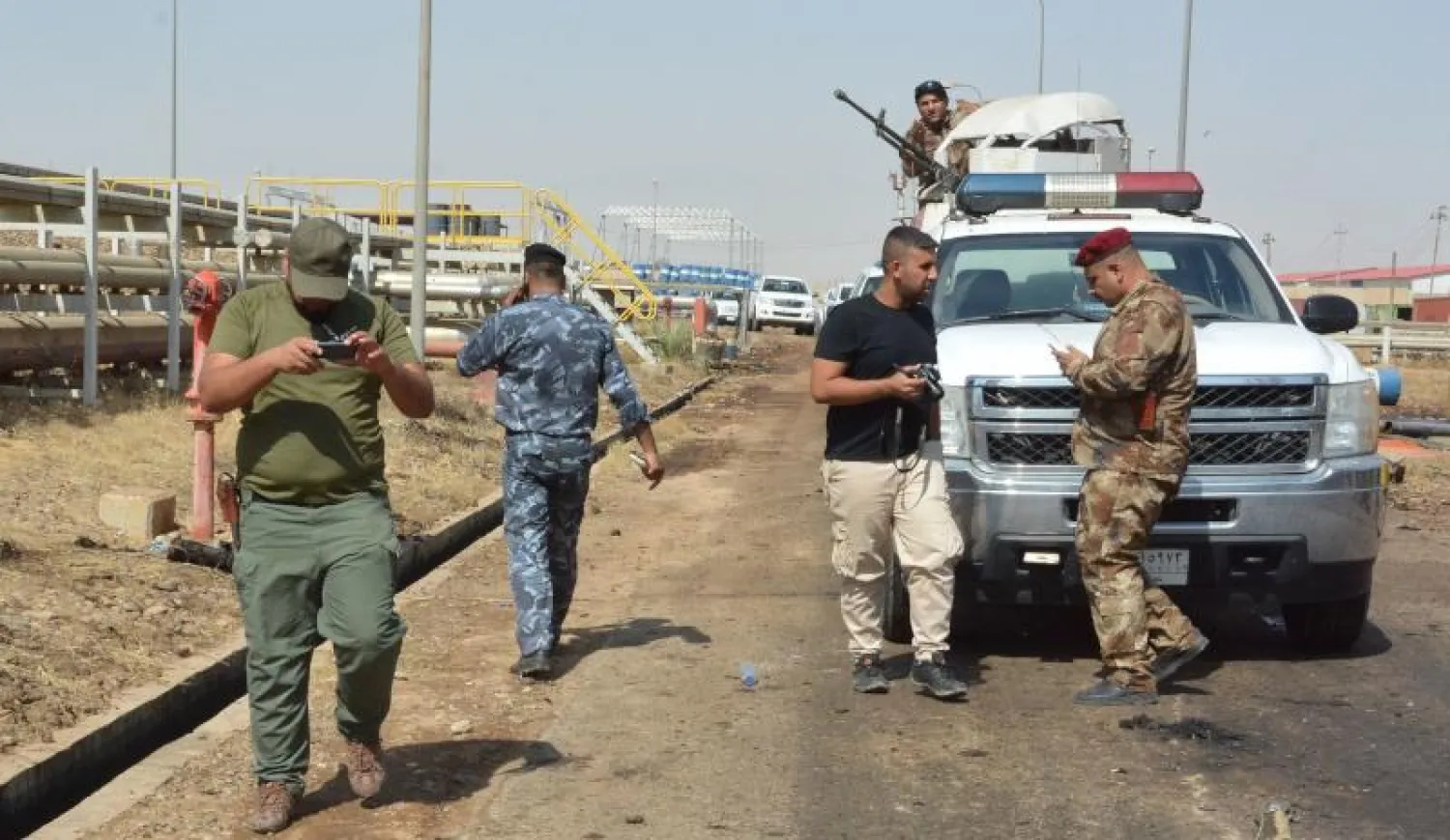 بعض الأفراد من قوات الأمن العراقية (أ.ف.ب)