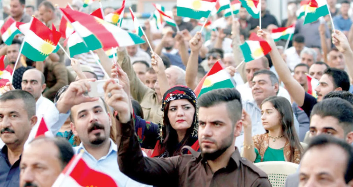 أكراد مؤيدون للاستفتاء على استقلال كردستان خلال تجمع لهم في كركوك (رويترز)
