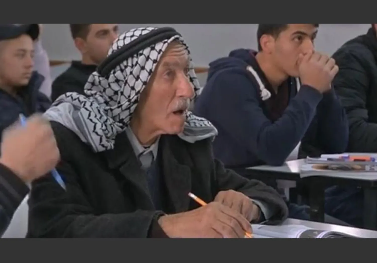 Palestinian Abed Abu Ajamiyeh, 77, is enrolled in high school classes. (photo credit: REUTERS)