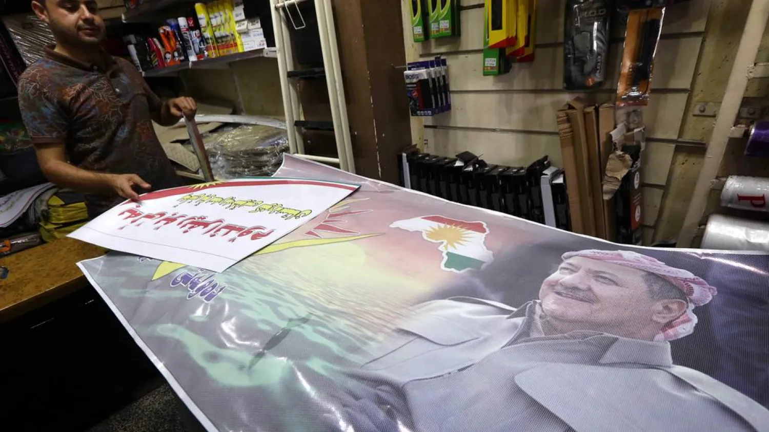 Gearing up for the upcoming referendum on independence with posters of Iraqi Kurdish leader Masoud Barzani in Irbil, capital of the autonomous Kurdish region. (AFP)