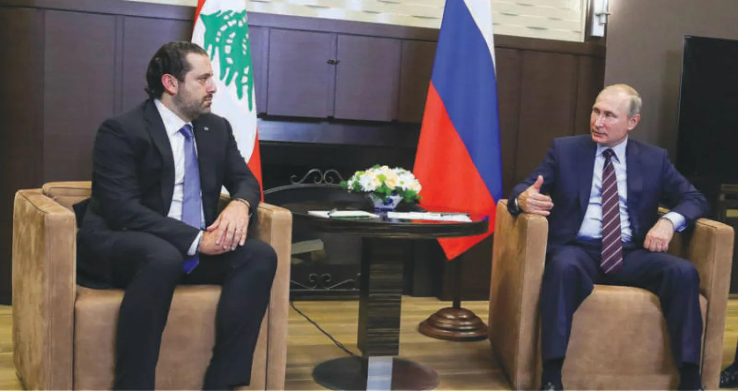 بوتين مستقبلا الحريري في سوتشي أمس (أ ف ب)