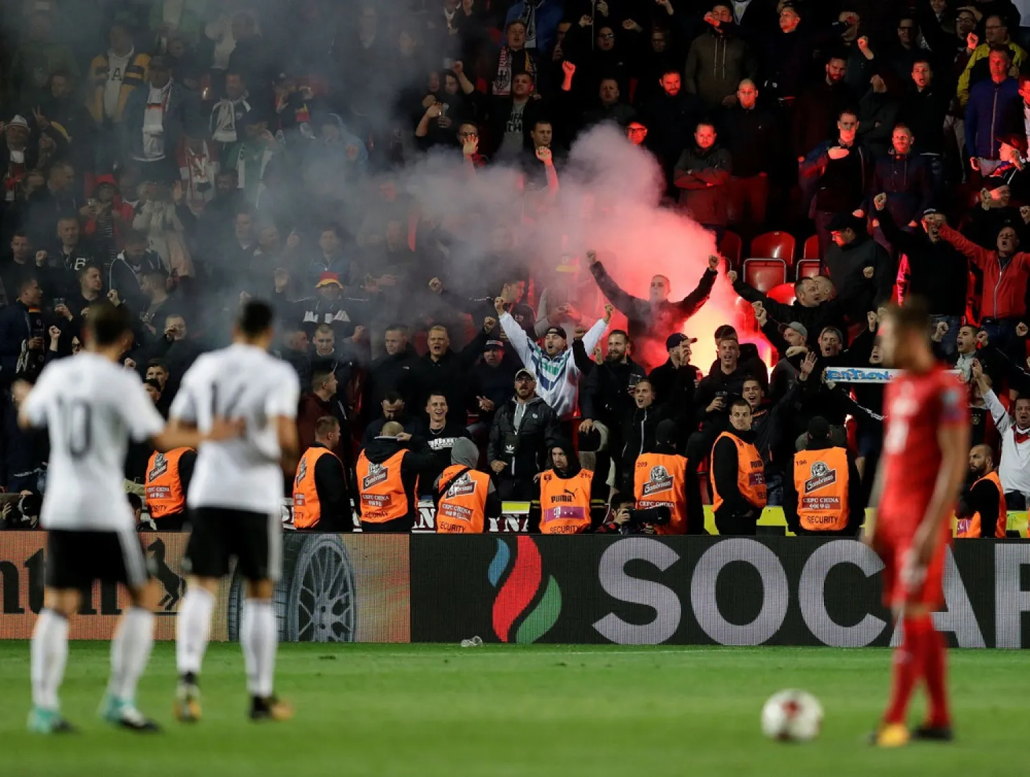 German supporters light flares during the FIFA World Cup 2018 qualifying match between Germany and the Czech Republic in Prague on September 1, 2017. (Reuters)