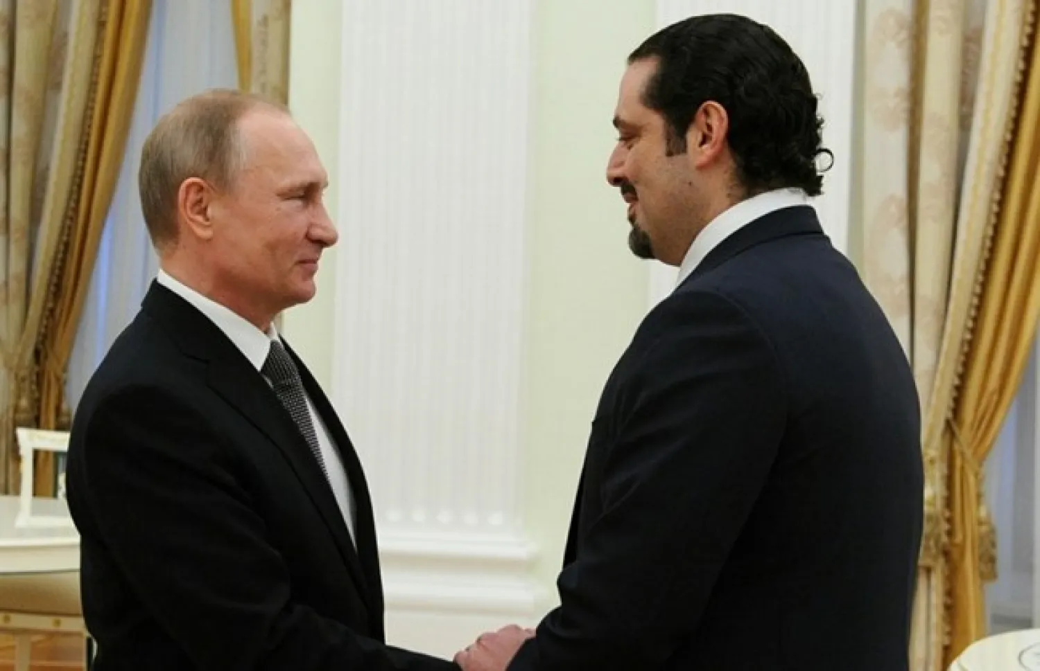 Russian President Vladimir Putin (L) shakes hands with former Lebanese Prime Minister Saad Hariri during a meeting at the Kremlin in Moscow, Friday, April 1, 2016. (The Daily Star/Dalati Nohra, HO)
