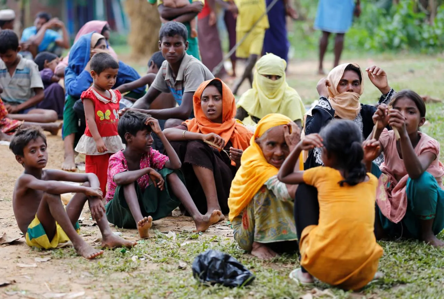 New Rohingya refugees wait to enter the Kutupalang makeshift refugee camp, in Cox's Bazar, Bangladesh, August 30, 2017. REUTERS/Mohammad Ponir Hossain