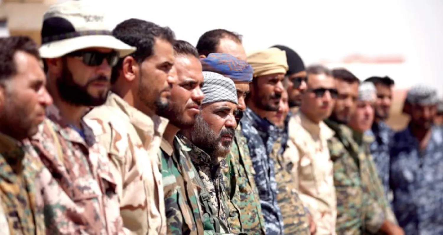 مقاتلون من «مجلس دير الزور العسكري» المدعوم من أميركا (رويترز)