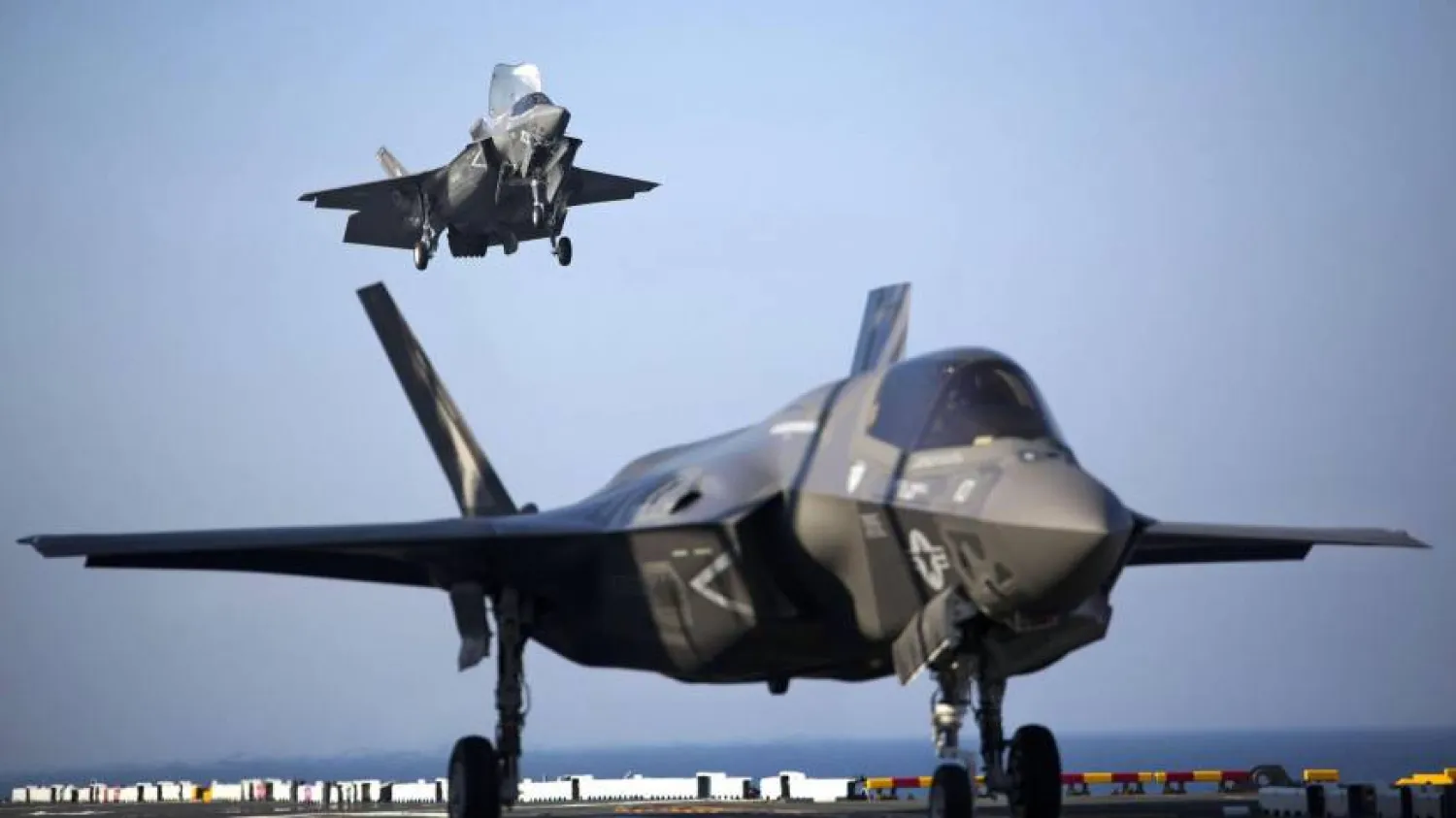 Two US Marine F-35B fighters complete vertical landings aboard the USS Wasp during operational testing in May 2015. Reuters photo