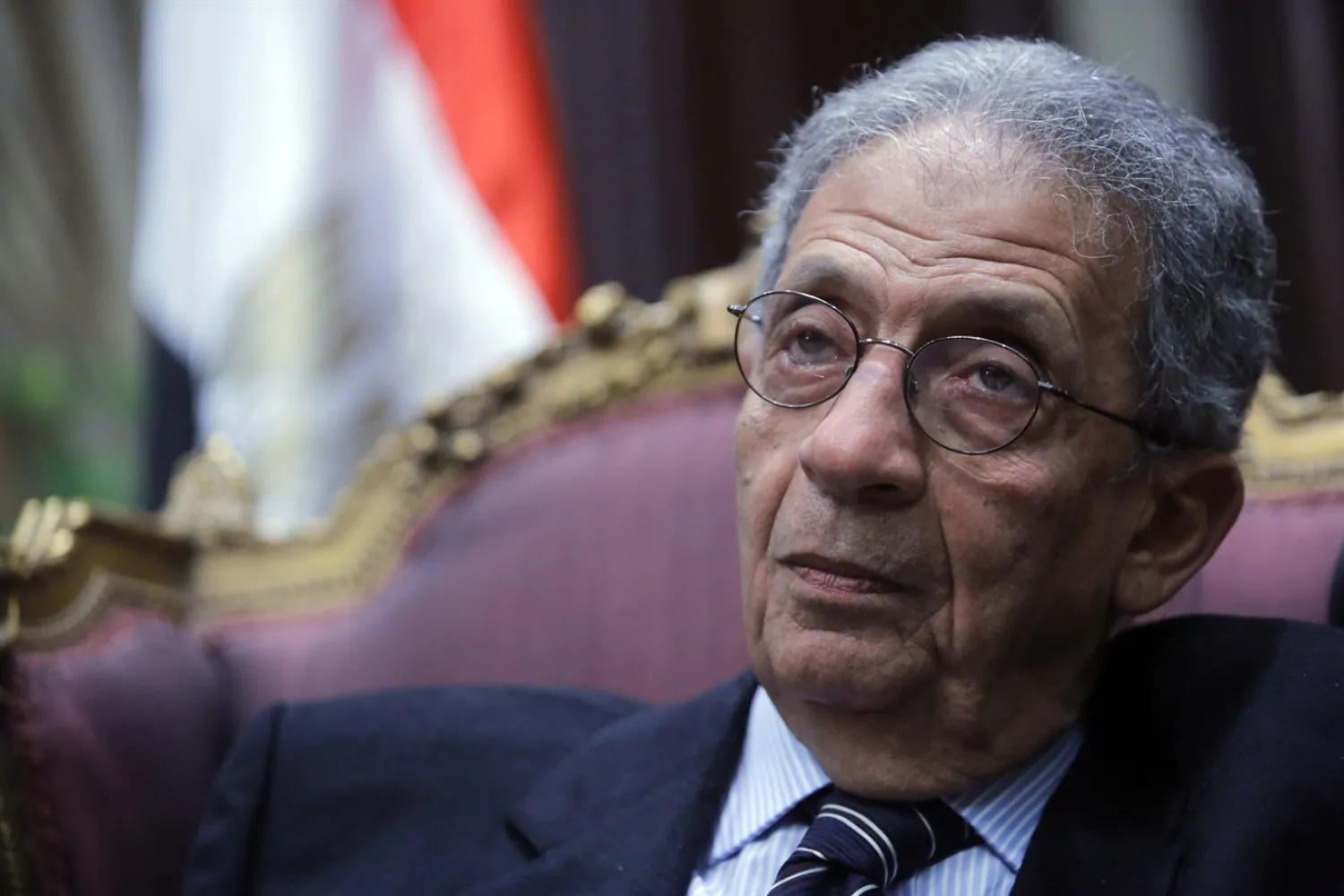 In this Tuesday, Dec. 10, 2013, file photo, Amr Moussa listens during an interview with The Associated Press at the Shoura Council in Cairo (AP Photo/Amr Nabil, File)