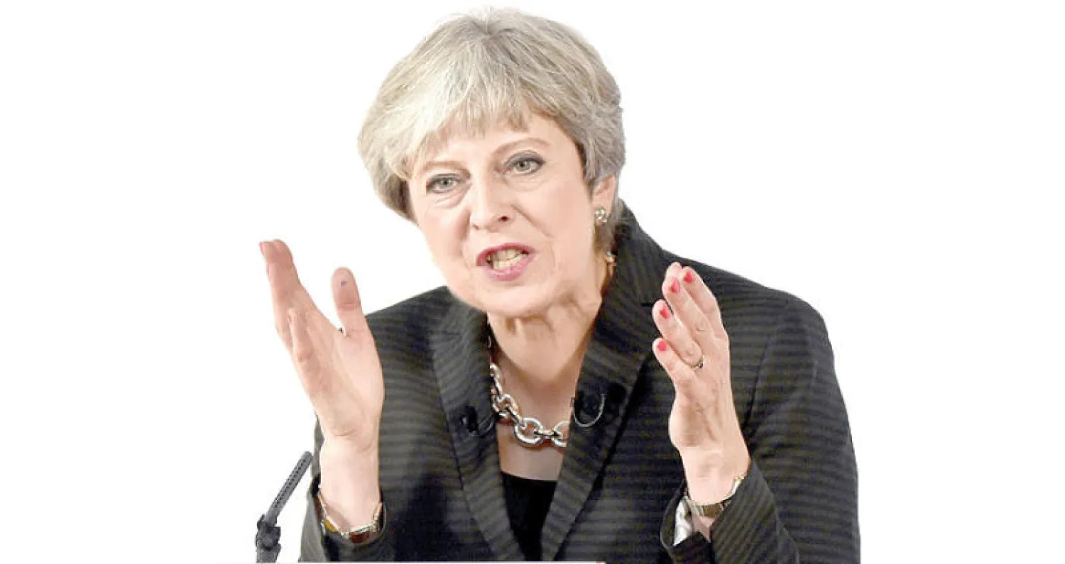 رئيسة الوزراء البريطانية تيريزا ماي (رويترز)