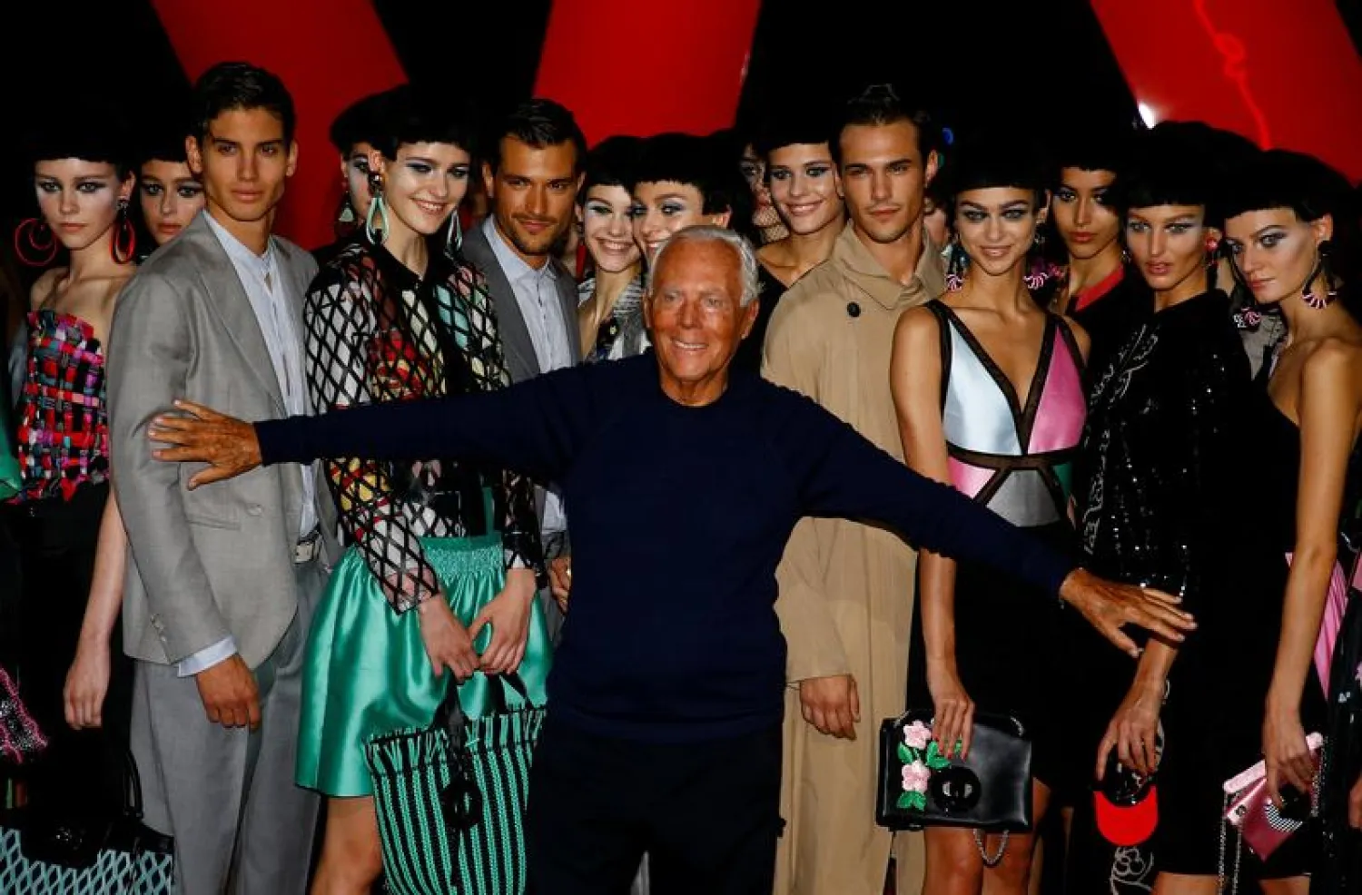 Italian designer Giorgio Armani acknowledges applause at the end of his Spring/Summer 2018 show at the Milan Fashion Week in Milan, Italy. REUTERS/Stefano Rellandini