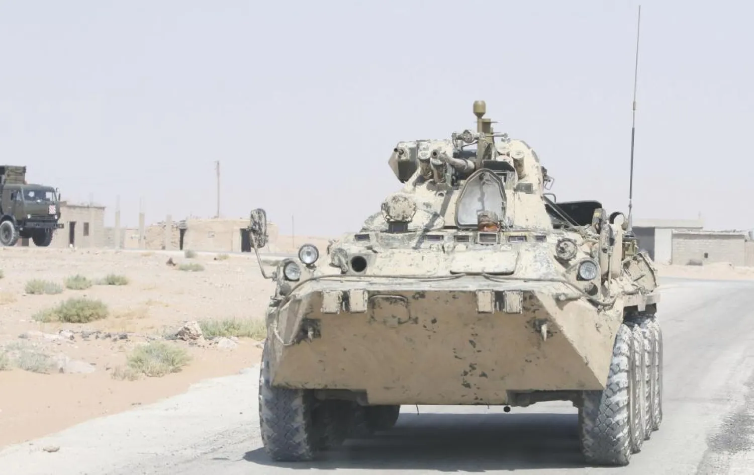 A Russian military vehicle is seen on the road heading to Deir Ezzor. Reuters photo