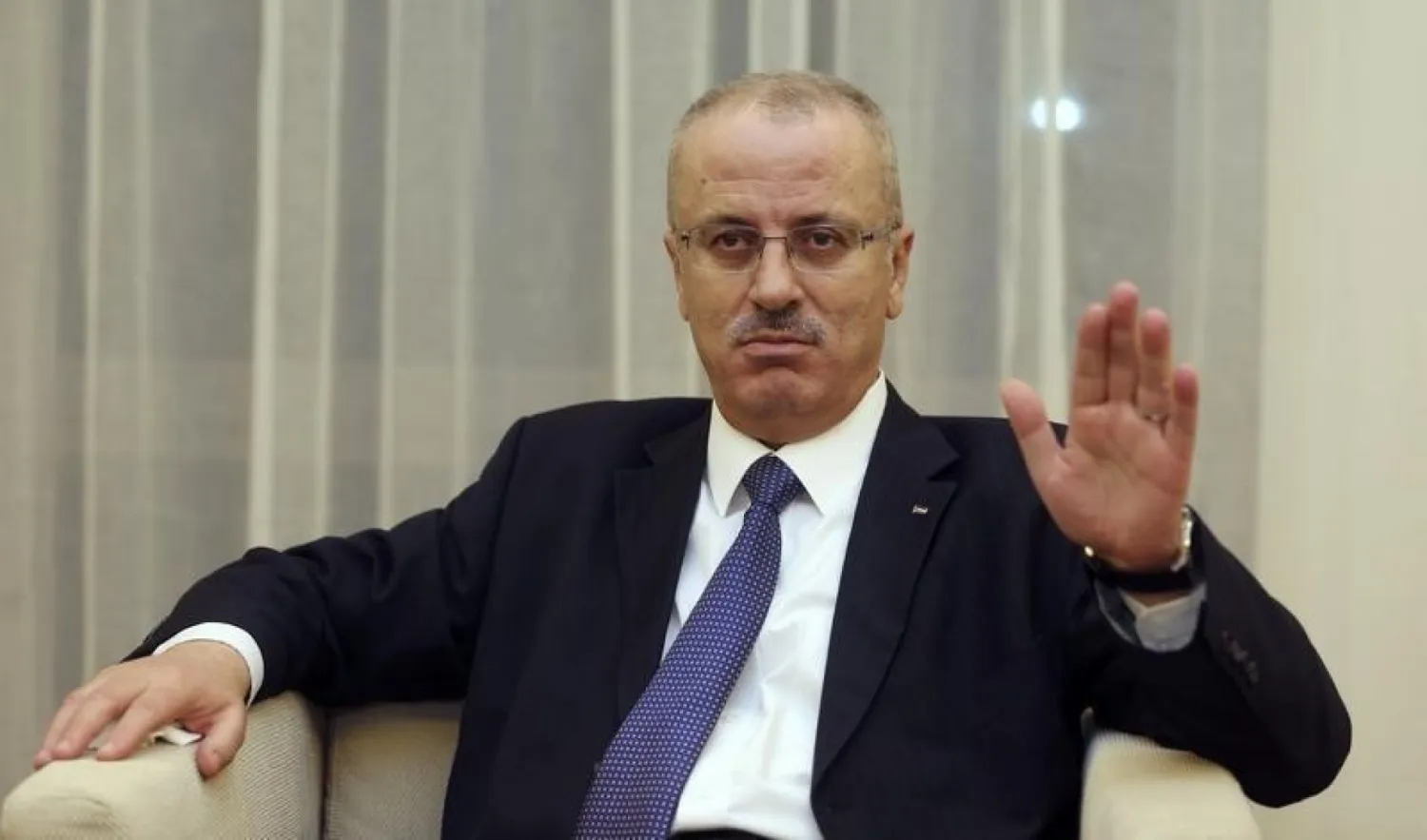 Palestinian Prime Minister Rami Hamdallah speaks with Reuters in Doha. Photo: Reuters