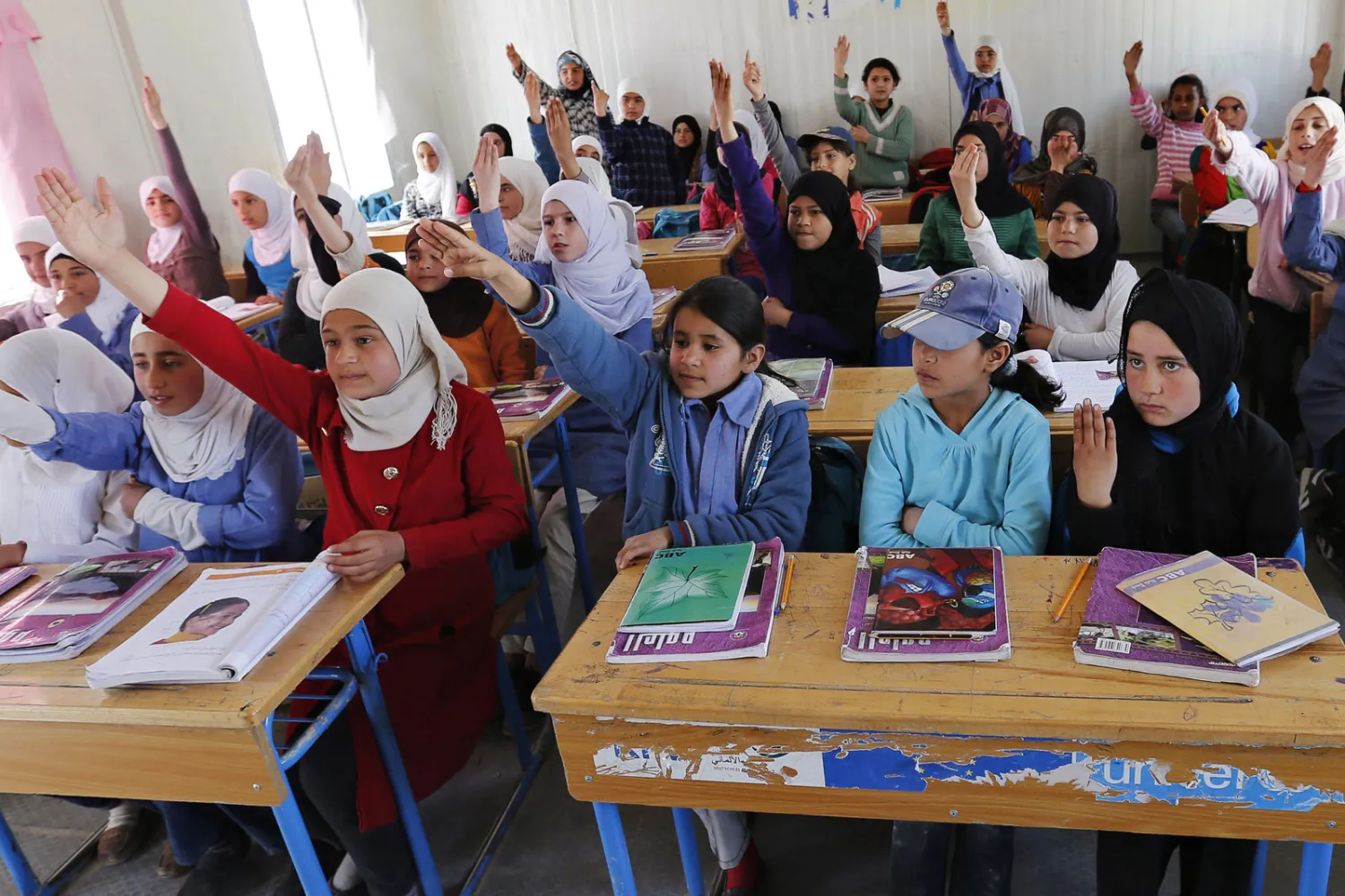  Syrian refugees in a UNICEF school at the al-Zaatari refugee camp, Jordan, March 11, 2015 (Muhammad Hamed/Reuters)
