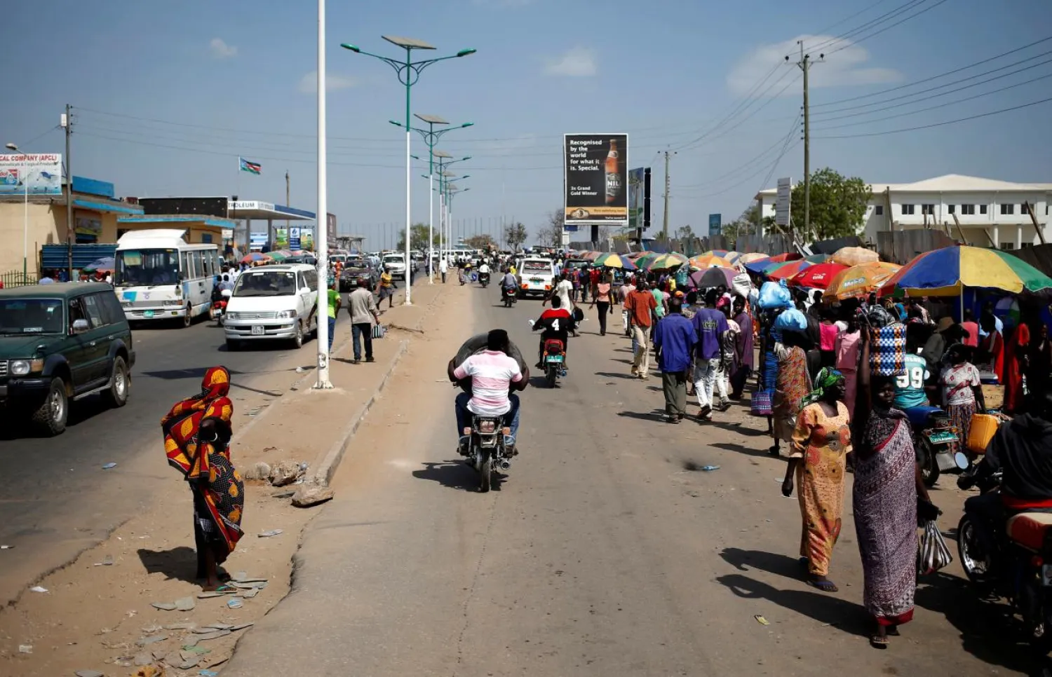 People walk along a street in Juba, South Sudan December 21, 2013. REUTERS/Goran Tomasevic/File Photo