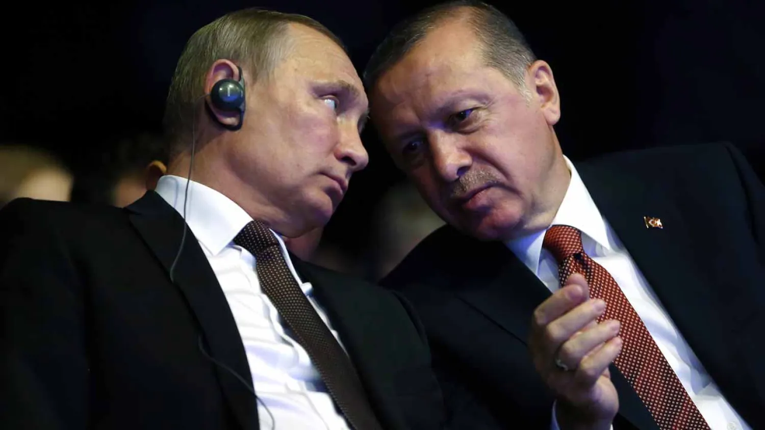  This file photo taken on October 10, 2016 shows Turkish President Recep Tayyip Erdogan (R) talking with his Russian counterpart Vladimir Putin during the opening ceremony of the 23rd World Energy Congress in Istanbul, Turkey. KAYHAN OZER / TURKISH PRESIDENTIAL PRESS OFFICE / AFP