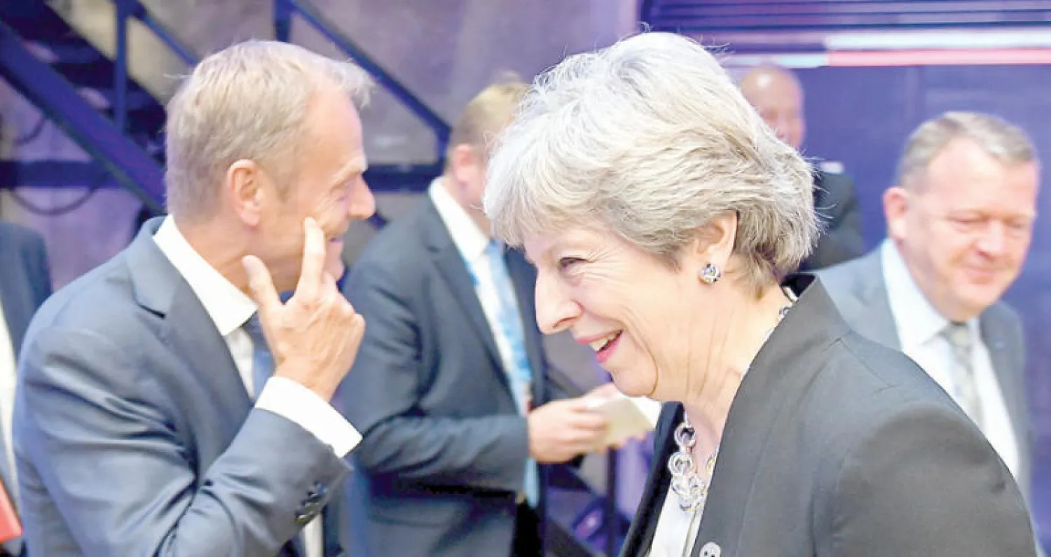 تيريزا ماي خلال القمة الأوروبية في إستونيا (أ.ف.ب)