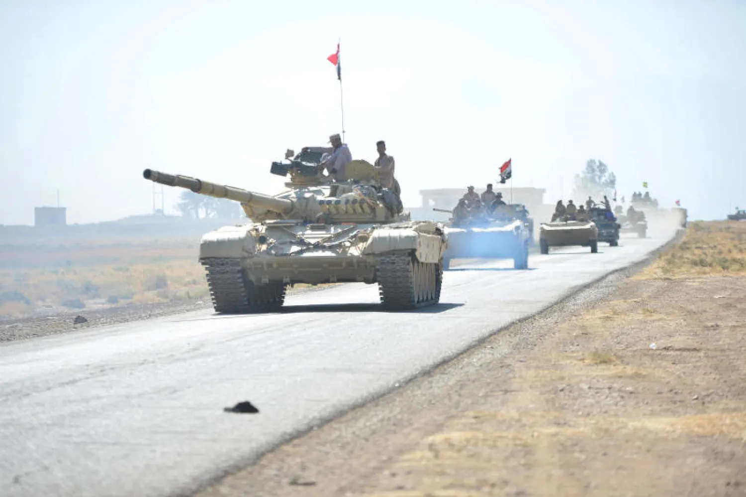 دبابات الجيش العراقي على مشارف الحويجة (رويترز)