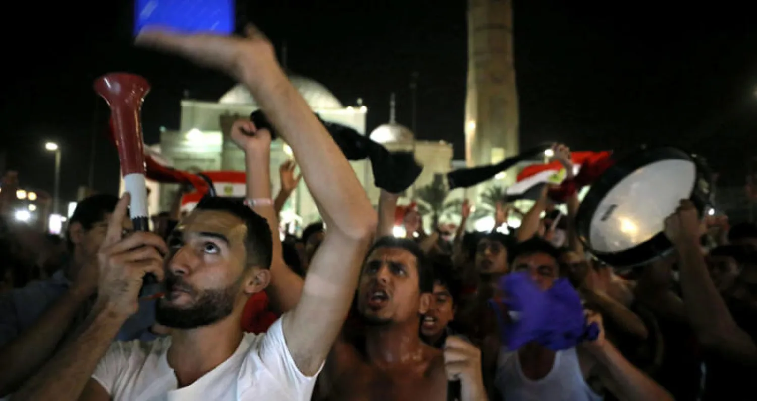 الشعب المصري يحتفل بتأهل منتخب بلاده لمونديال 2018 (رويترز)