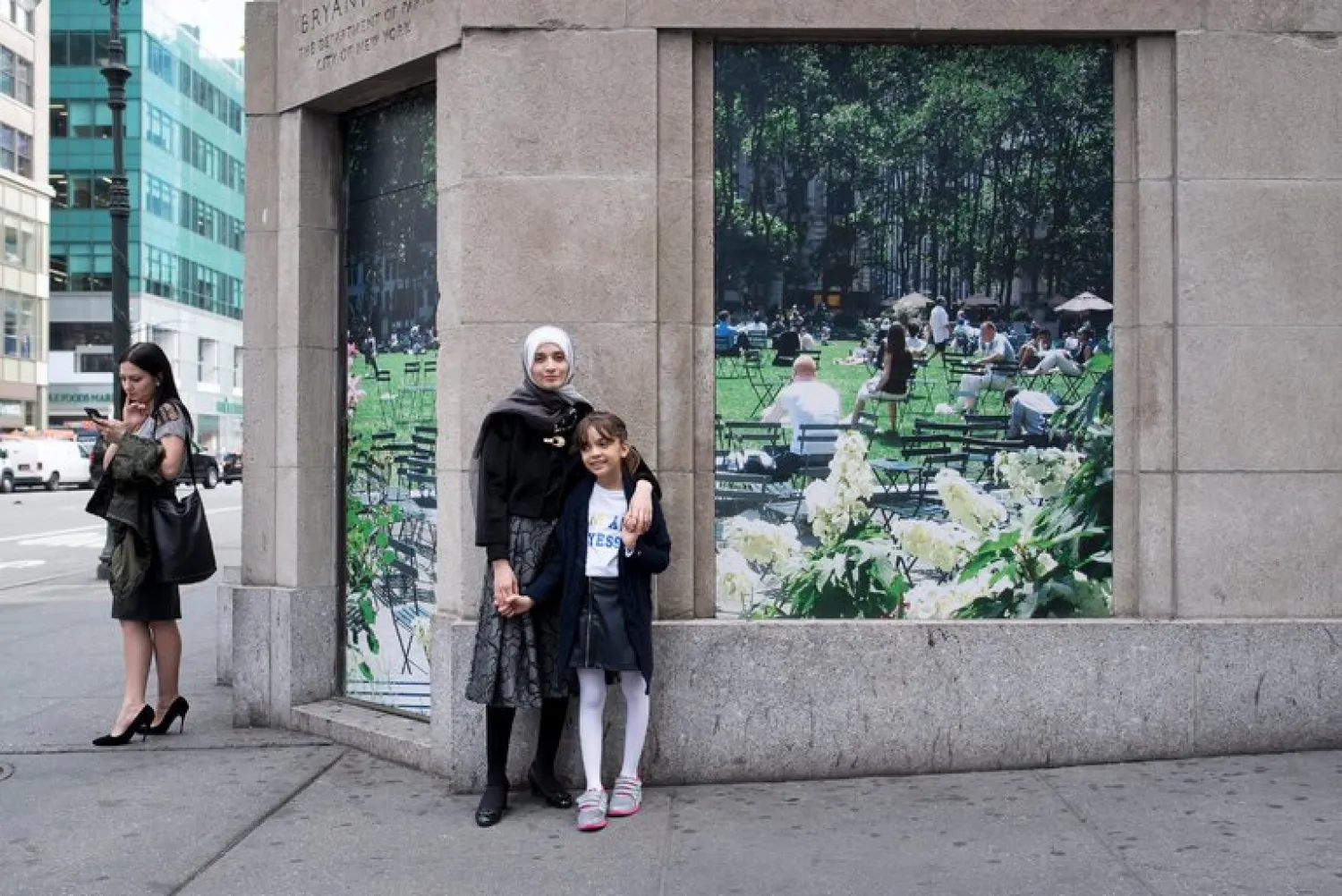 Bana al-Abed with her mother, Fatemah, near Bryant Park in New York on Friday. Credit Karsten Moran for The New York Times