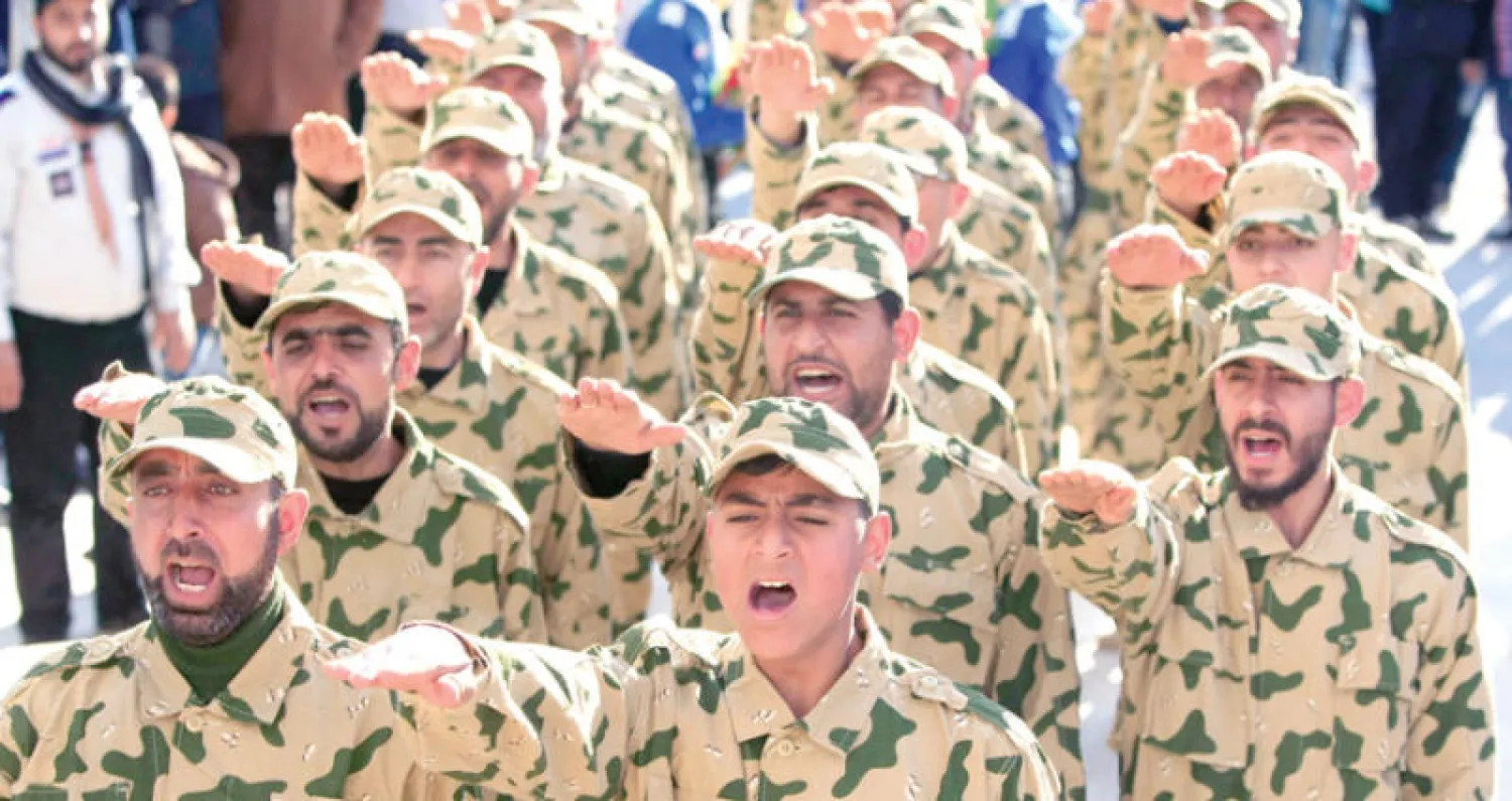 استعراض لقوات من «حزب الله» في فبراير الماضي لتكريم مقاتلين من الحزب (أ.ب)