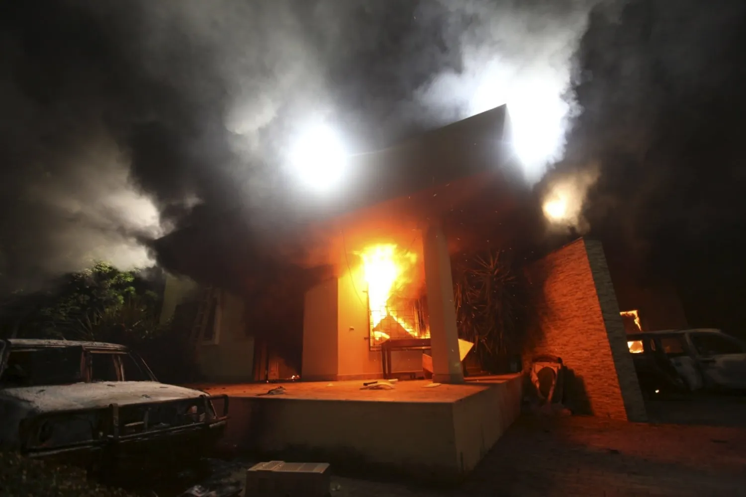 The US Consulate in Benghazi is seen in flames in the 2012 attack. (Esam Al-Fetori/Reuters)