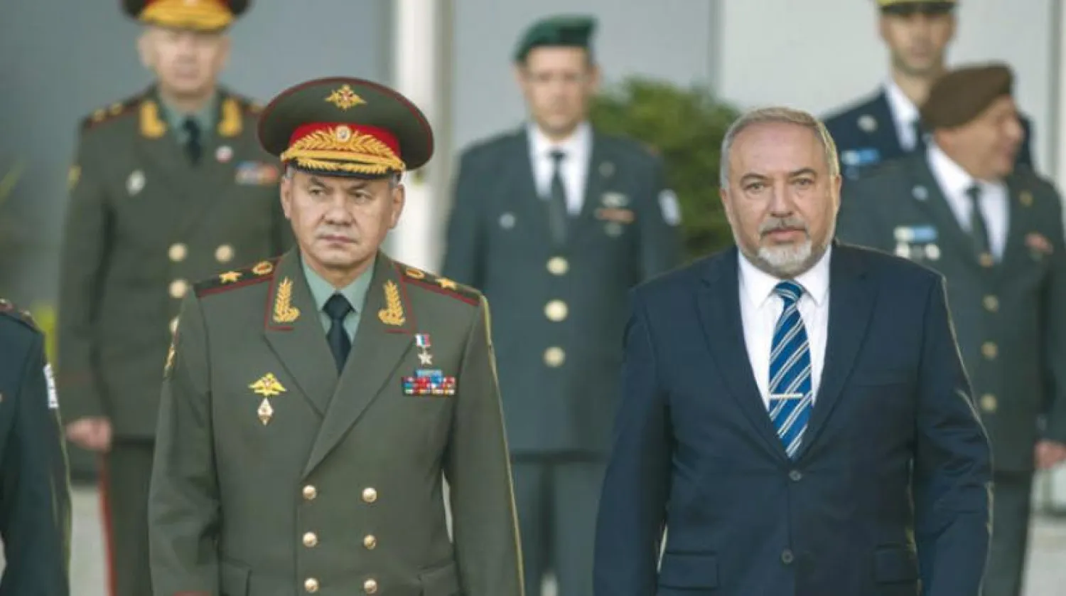 Russian Defense Minister Sergey Shoigu meets his Israeli counterpart Avigdor Lieberman in Tel Aviv. (AFP)