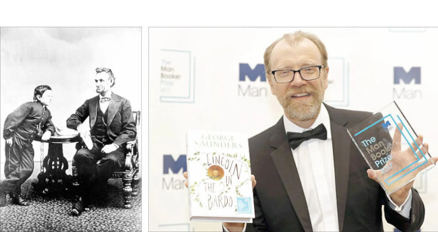 جورج سوندرز حاملاً روايته... وجائزته - أبراهام لينكولن وابنه الذي مات عن أحد عشر عاماً