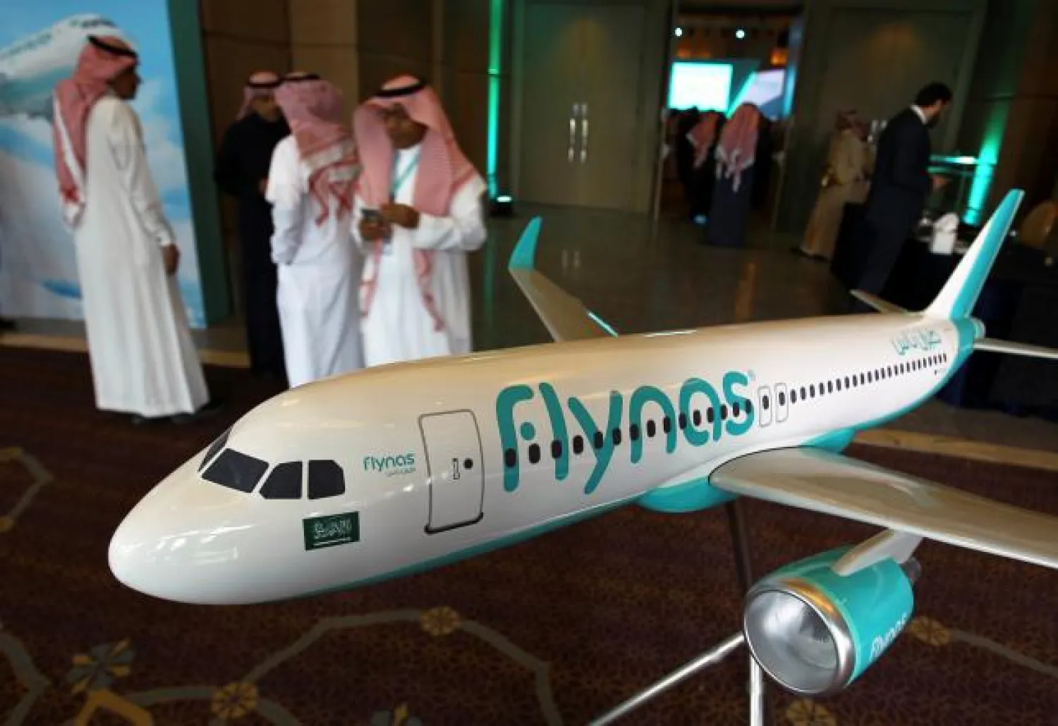 A model of Saudi airline Flynas is on display during a ceremony to sign a deal between Airbus andFlynas in Riyadh, Saudi Arabia January 16, 2017. REUTERS/Faisal Al Nasser