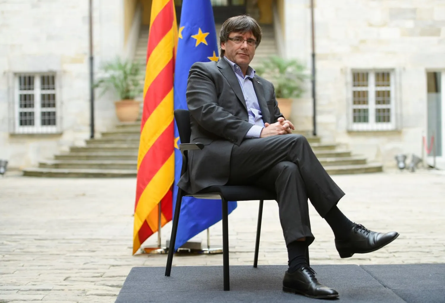 Catalan president Carles Puigdemont poses before an AFP interview in Girona on September 30, 2017. AFP photo