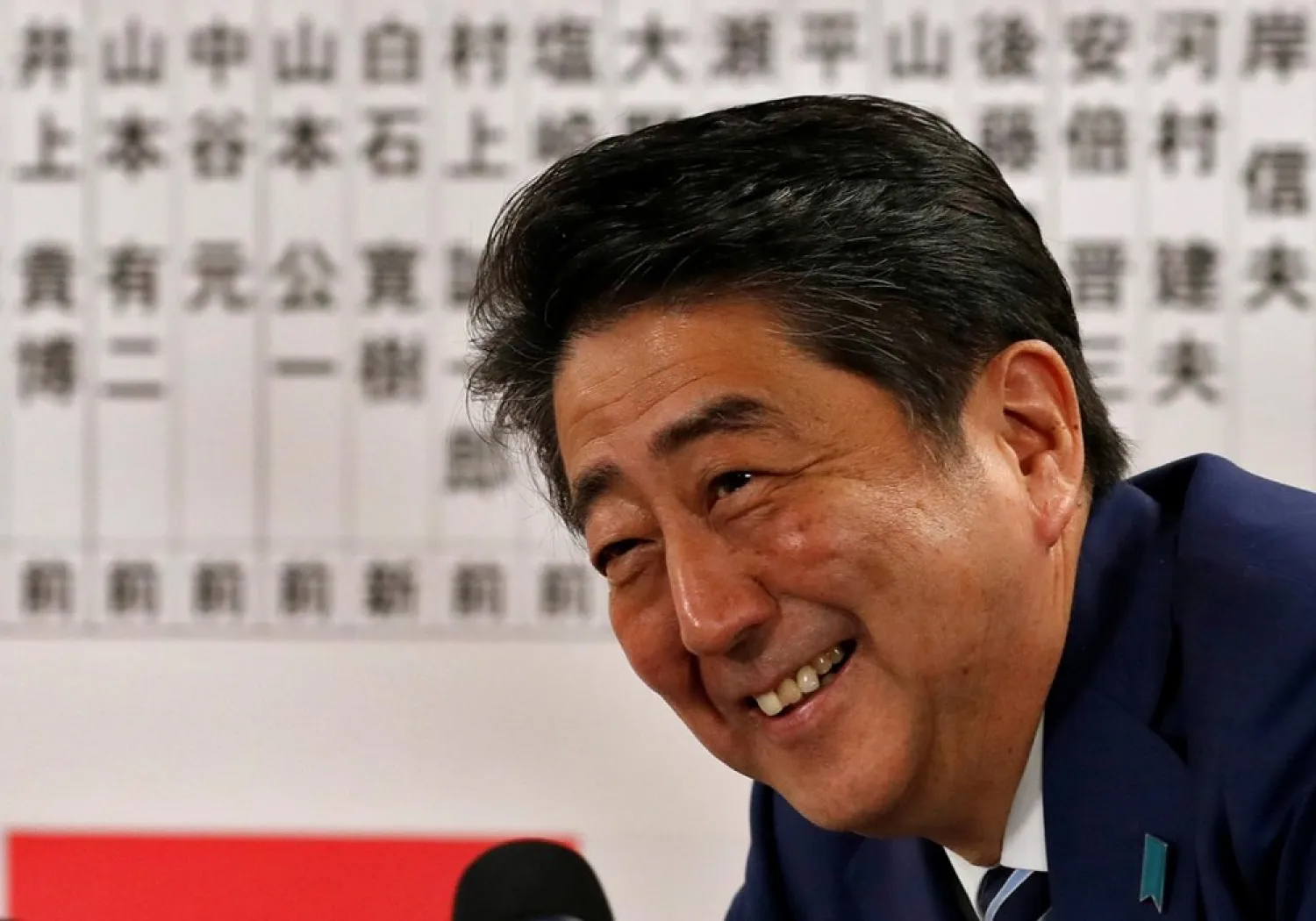 Japan's PM Shinzo Abe smiles during a news conference after Japan's lower house election, at the Liberal Democratic Party headquarters in Tokyo, Japan October 22, 2017. (Reuters)
