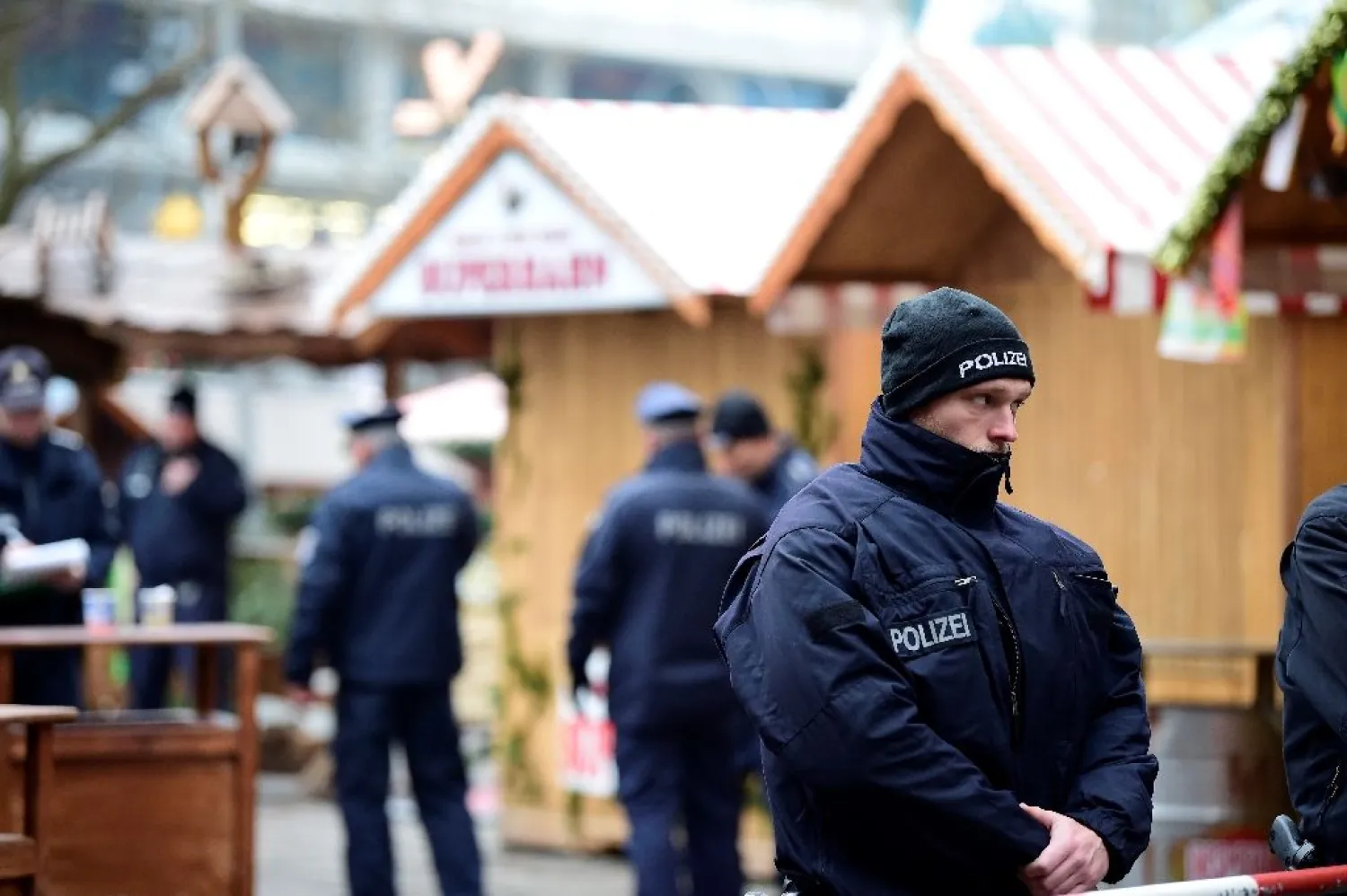 German police officers seen the day after a terror attack, in central Berlin, on December 20, 2016 (AFP Photo/Tobias SCHWARZ) 