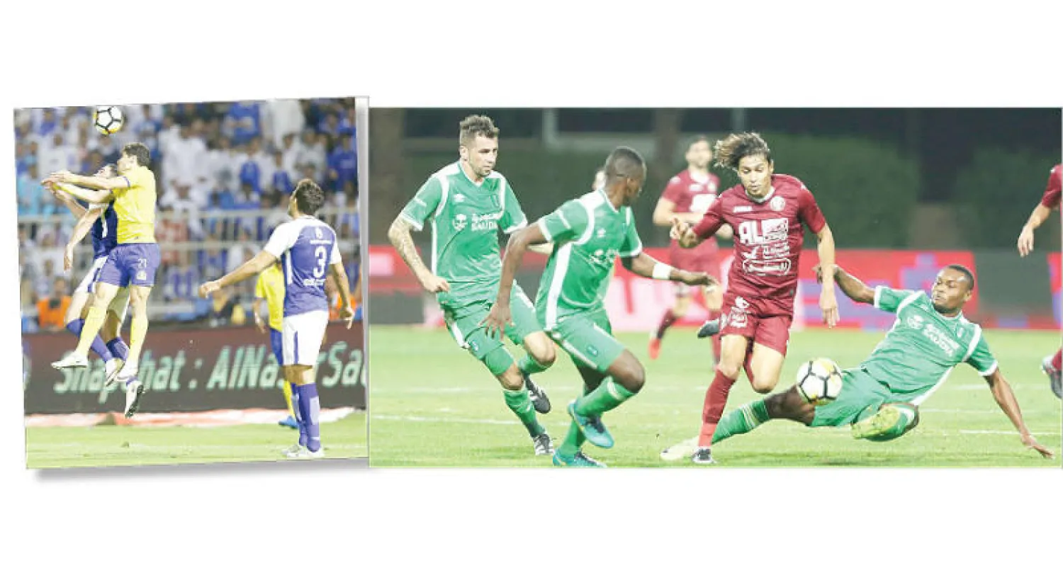 من مباراة الفيصلي والأهلي في المجمعة (تصوير: سعد العنزي) - جانب من مواجهة ديربي العاصمة أمس (تصوير: بدر الحمد)