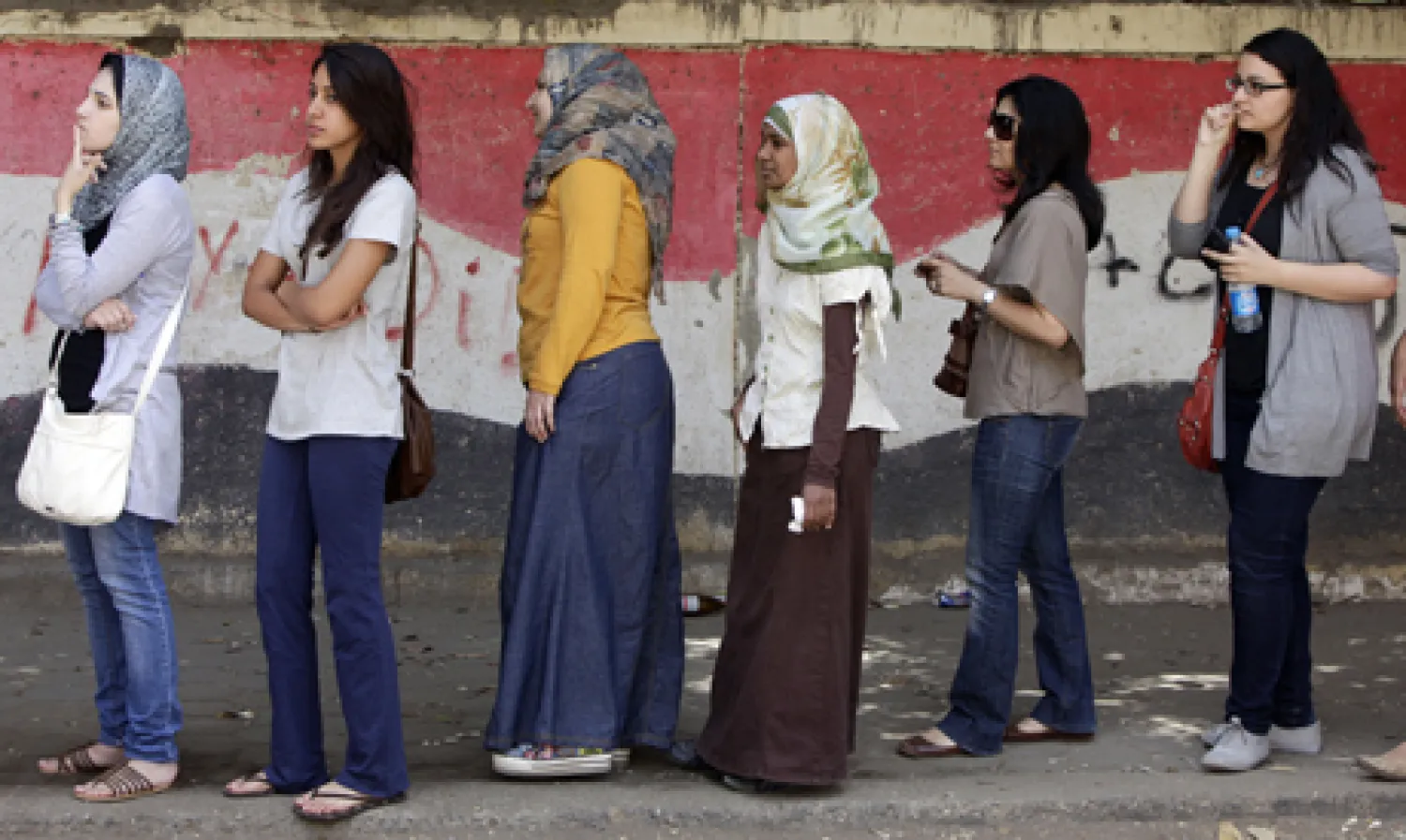 Egyptian women line up outside a polling station in Cairo, Egypt. AP