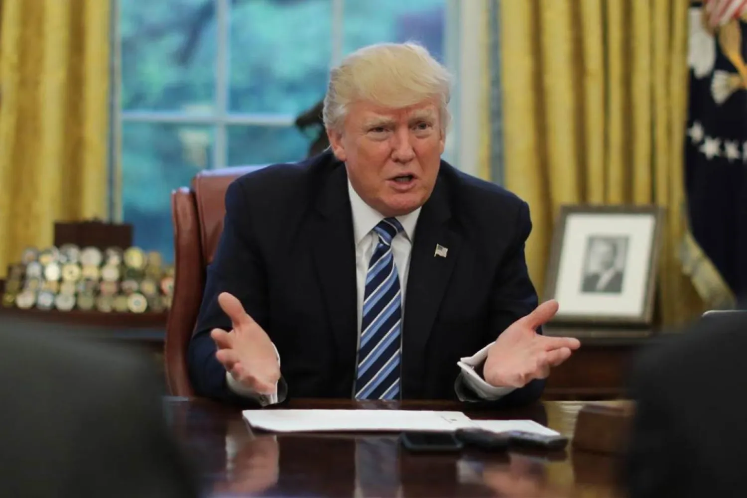 US President Donald Trump speaks during an interview with Reuters in the Oval Office of the White House in Washington on April 27, 2017. Credit: Carlos Barria/Reuters/Files