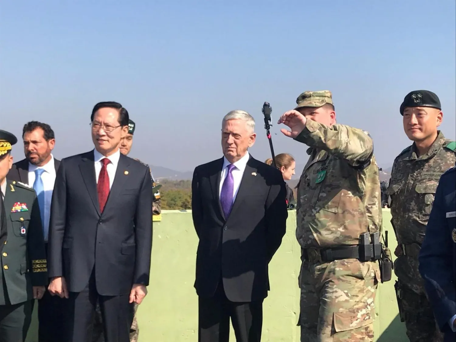 US Defense Secretary Jim Mattis and his South Korean counterpart Song Young-moo peer into North Korea from Observation Post Ouellette in the demilitarized zone separating North and South Korea October 27, 2017. REUTERS/Phil Stewart 