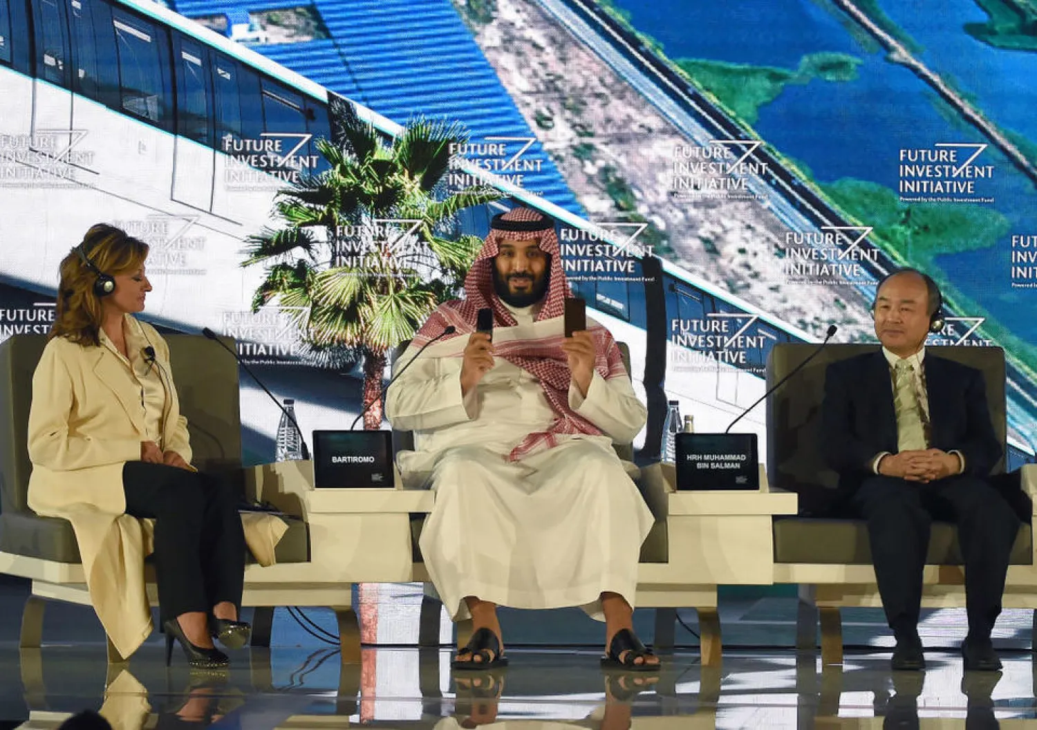 Saudi Crown Prince Mohammed bin Salman (centre), US journalist Maria Bartiromo (left) and Masayoshi Son. the CEO of SoftBank attend the Future Investment Initiative FII conference in Riyadh Photo: FAYEZ NURELDINE/AFP/Getty Images
