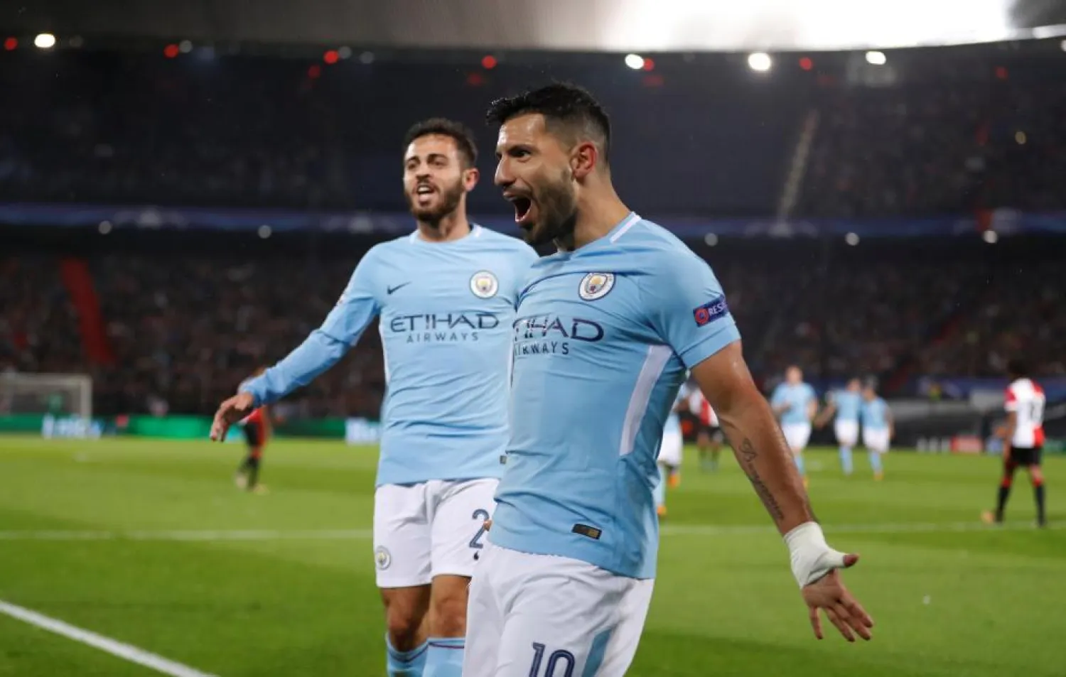 Manchester City striker Sergio Aguero celebrates after scoring a goal against Feyenoord during a Champions League match in September. (Reuters)